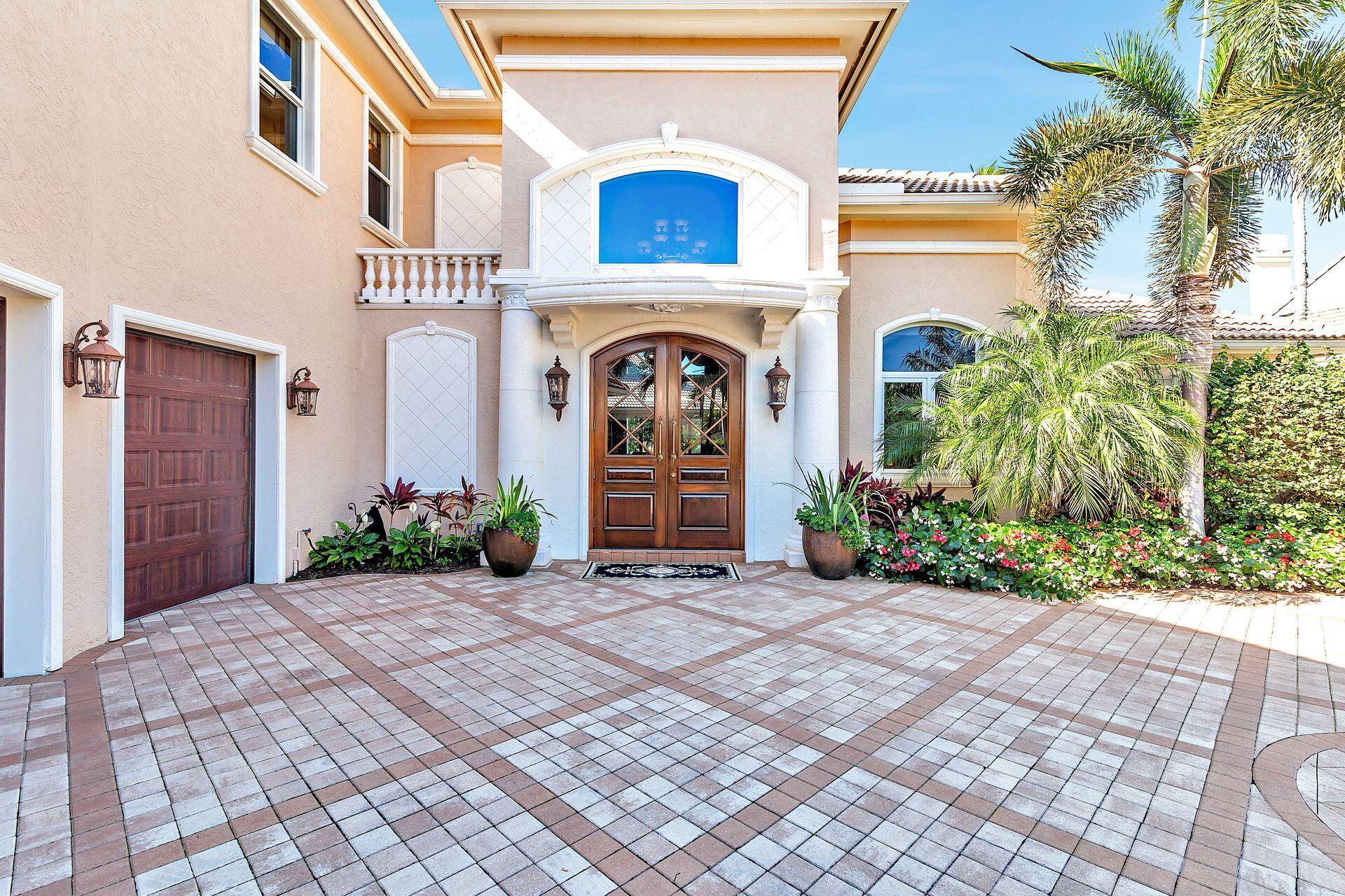 Attention Serious Boater Absolutely stunning'' is what you, your family and friends will say when walking through the front door of this amazing waterfront home in the most desired Casseekey Island community of Jonathan's Landing. The expansive waterfront has room for up to an 80 foot yacht and a 36 foot boat and is just two minutes to the intracoastal. This sophisticated 5 bedroom 7-1/2 bathroom custom waterfront home is absolutely perfect in every possible way. The home was transformed in 2015 with an attention to detail during its major renovation. Incredible views through large windows across the waterway to the Village golf-course's 17th hole will strike you at every angle as you walk through this 6,018 square feet home. As you enter from the front foyer a huge great room living area with custom stone tile floors, 11-foot ceiling, custom kitchen, dining room, bar area and bright sunroom awaits you. The spacious kitchen is a chefs' dream boasting a high-top counter with seating for six, custom millwork cabinets, quartz countertops, Wolf burner gas stove including double ovens, a microwave, a new refrigerator, full sized Bosch dishwasher, 2 sink areas and the list continues. Just off the kitchen is a beautiful bright sunroom with large windows and doors that overlooks and leads to the outside patio/party area.  This 1700 square foot outside patio has travertine pavers, a large, heated saltwater pool, and gazebo with outdoor kitchen and bar. The patio than leads you to a large dock with new decking and 2 boat slips which one can accommodate up to an 80-foot yacht. Rounding out the first floor is a custom built private office with bath, master bedroom suite with beautiful his and her bathrooms and large walk-in closets with custom built-in shelving/drawers. There is also a second large master bedroom suite with large bathroom and private sitting area on the second floor. Lastly, a grand staircase and hallway overlooking the first floor leads to a second floor with  large bedroom suites each with beautiful baths.;Other amenities include an extensive brick paver front driveway leading to a huge 2-1/2 door garage, off-street parking for up to 8 cars, walk-in wine cellar, home automation for security-lighting-audio-video systems, elevator, boating/fishing storage room, an energy efficient heating and cooling system, tankless water heater systems, first floor electric window shades.;If you are looking for the perfect Jonathan's Landing waterfront home for entertaining your friends and family, enjoying three championship golf courses, two grand clubhouses, playing tennis and pickle ball, and enjoying Jupiter and Palm Beach beach's, restaurants, shopping, and cultural activities... look no further!;Rarely does a waterfront property of this caliber come on the market in the gated secure community of Jonathan's Landing.;