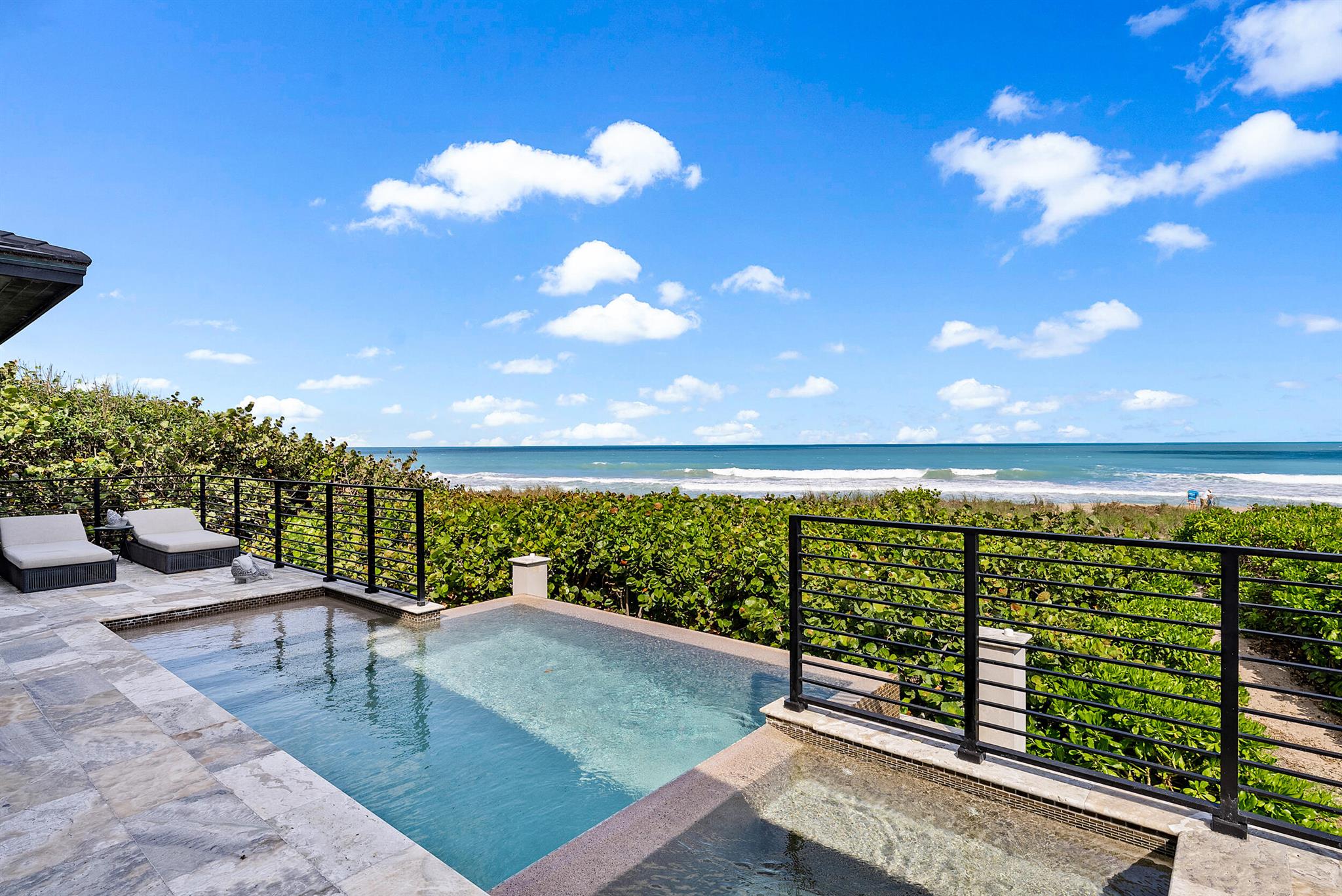 Breath taking oceanfront zen styled custom home, oceanfront-to-bay, built in 2019 designed by famous architect Randall E Stofft, gated private cul de sac, .93 acre plus 5 car garage,  this one of a kind estate features rich details and intricate sophisticated finishes, full wet bar lounge room w/ humidor, wine cellar off stunning oceanfront dinning room, kitchen w/large island adjoining to outdoor kitchen and ocean views, living room over looking pool to ocean, fabulous theater room, yoga/message room, expansive third floor with 3 bedroom on suites with balconies overlooking ocean and bay sunsets.