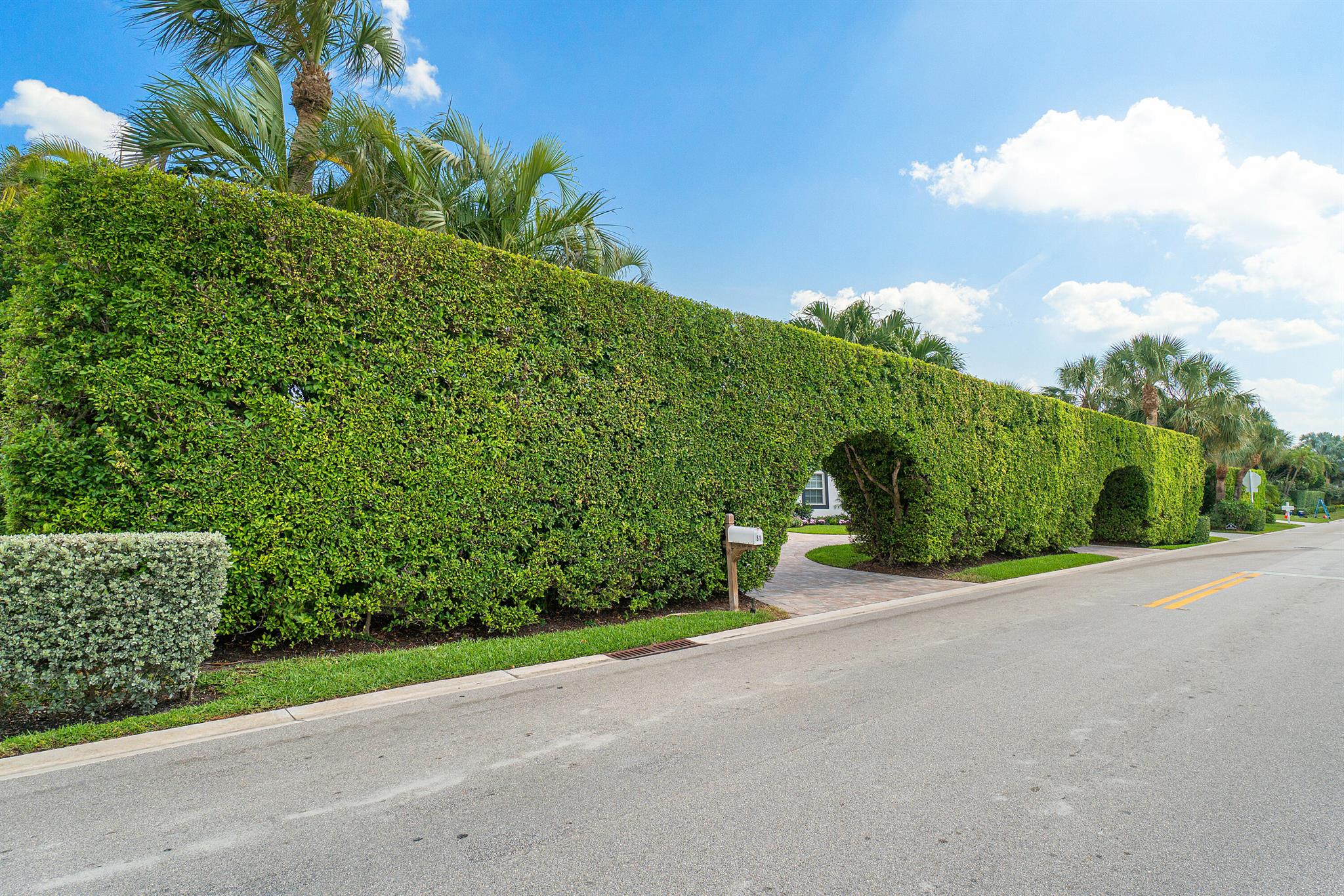 This gem is hidden by large private Palm Beach arched hedges perfectly situated between the Ocean and the Intracoastal on the southern end of the prestigious Jupiter Island, and just steps away from the beach! With a new roof, step inside and take in the beautiful French Oak flooring and vaulted ceiling, and a kitchen that has stunning Carrara marble & equipped with high-end appliances. When you want to relax, just step into your primary bedroom, and enjoy the feel of a European spa or head to your private oasis of a backyard to take a swim in your pool. With complete hurricane impacted windows, this home was completely reconstructed in 2008 & the attached cabana was designed to be the perfect place for guests, mother in-law suite, nanny quarters, or an office escape from the main house Location, Location, Location! You can kayak, paddleboard, or jetski STEPS away from the Intracoastal or take a dip in the Atlantic Ocean. A short walk away to the JIB marina, private beach club &amp; Coral Cove Park. Surrounded by top local places to eat such as Guanabanas, Lucky Shuck, Blackbird &amp;  Michael Jordan's restaurant-1000 North. Less than 25 minutes from the PBI Airport. Jupiter Inlet Colony also has its own private police station.