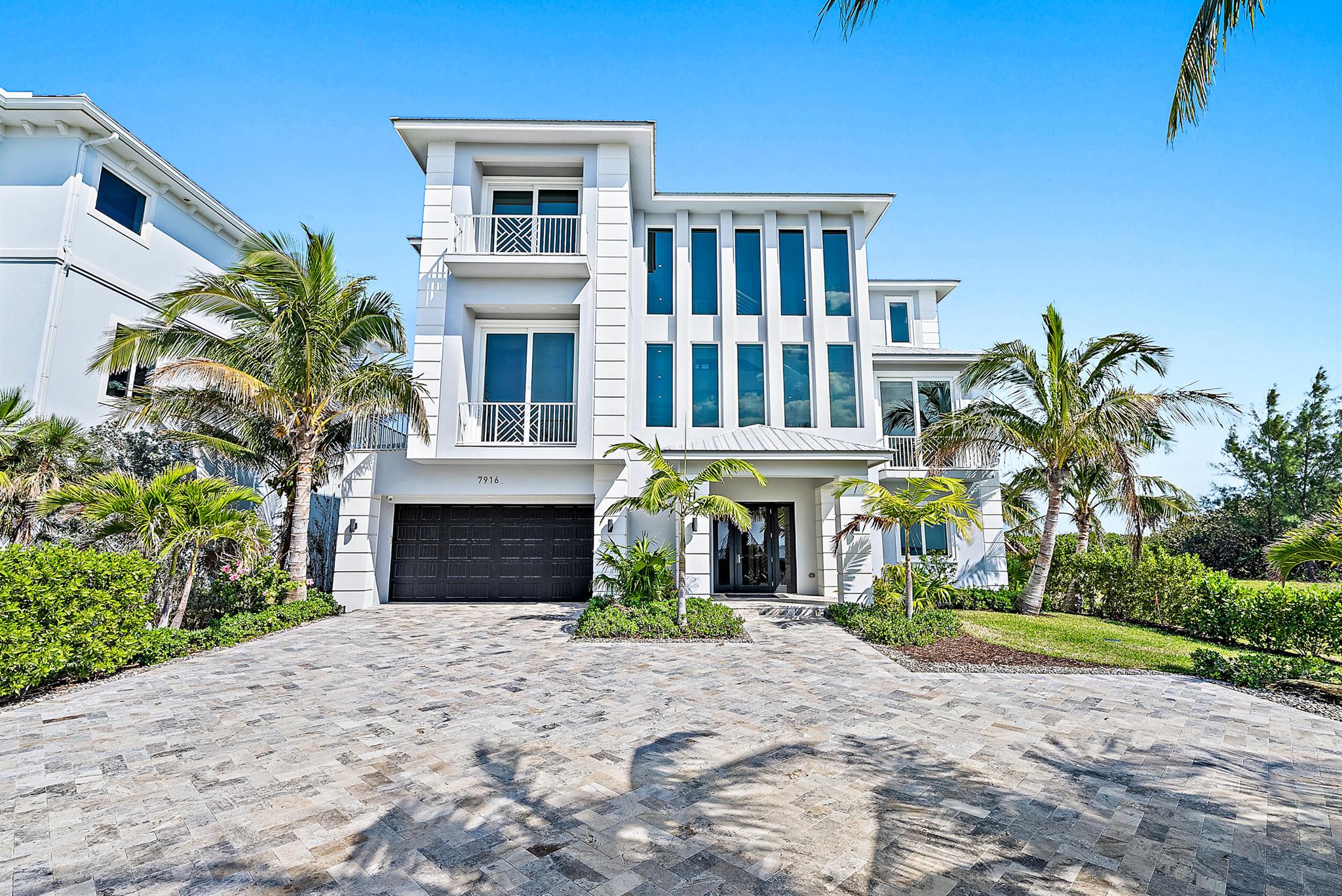 If you are looking for the absolute perfect beach house THIS IS IT! One of the biggest homes in Diamond Sands, a gated community of only 45 homes. This new construction home was custom built by the owner to the highest standards that can only be seen in person. One of two locations in South Florida that has direct oceanfront and intracoastal/bay views with absolutely no obstructions on the bay side. This three story home truly features it all, no expense has been spared in designing this estate. Upon entering the main floor you will be greeted by two rooms capable of becoming a game room, theater, gym, child's play area, or living quarters. views. On this main (second floor) level you will also find the kitchen with high end subzero and Wolf appliances with ample storage and cooking space. Off the back side of the kitchen you will find a large pantry and main level laundry room with dog wash and walk out balcony with direct bay views, don't feel like doing laundry? You will in this laundry room. Going back through the kitchen you will find the dining room with direct oceanfront views for those Sunday or Holiday dinners and cabana bath with shower and a walkout onto the pool deck. The pool area is one that will allow you to feel like you never have to leave the house. A full spa and infinity edge pool overlooking the ocean and expansive deck to accompany all the seating imaginable. Staying in for the night? We have you covered with a double Fire Magic grill where you can grill burgers and steaks while enjoying the stars on the open ocean. Walking back indoors you will find the incredible great room which flows into the the TV room that features a beautiful bar and full length window showcasing the incredible bay views. The TV room features a slider that walks out to the deck and spa. Also found on this main level is a guest bedroom with attached full bathroom. Elevator access can be found on all three levels. The main level also features an office/extra bedroom with extraordinary views of the bay and private balcony. Walking up to the third level will give you a full view of the bay from the stairs to stairwell landing. On the third level you will find a bay view guest bedroom with full bath that, you guessed it, also has bay views. The third floor is where you will find the bedrooms and TV sitting area. The master wing is a masterpiece where you will wake up and see the most beautiful sunrise every morning. Enjoy a cup of coffee on the master balcony and enjoy the beautiful ocean breeze. The master wing also features an oversized bathroom with his and her vanities and center shower with ocean view. There is a 400 sq. ft attached room in the master wing that could become a master closet or a combination of closet and child's room. Splitting the master bedroom wing and guest suite is a TV/sitting room featuring a coffee or nightcap bar and walk out balcony with expansive ocean and bay views. On the other side of the center sitting room is a guest suite fit for a king and queen featuring a big walkout balcony with direct ocean views. Walking back through the guest suite you will find a beautiful bathroom that has endless bay views especially while enjoying a relaxing soak in the freestanding tub. Exiting the guest suite you will also find a third floor laundry room next to the elevator so walking up and down stairs is a thing of the past. A full 5-6 car garage that doe shave AC and features a big storage area at the end of the garage for extra storage or a workshop. There is no where else in South Florida that you can find direct oceanfront views for an amazing sunrise and direct intracoastal/bay view for those perfect sunsets at these price points. If you are looking for a recently completed custom oceanfront home that still has some blank space for a theater, game room, play room, live in quarters, and the ability to complete the outdoor entertaining space with a fireplace and wet bar then this is your home. There truly is none other like it in Diamond Sands. Low HOA fees that include a virtual guard gate and landscaping for the ultimate beach house retreat. This home is ready for any buyer looking to find a great deal in South Florida with direct ocean front.