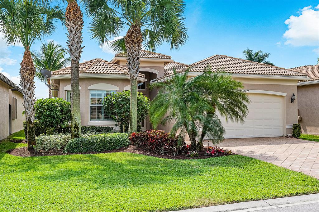 This light and bright Bimini model sits on a lakefront lot backing south.The 3 bedroom+den,3 bath home features  impact windows,widened walkway and driveway,extended garage,porcelain tile floors,recessed lights throughout,outfitted closets,plantation shutters,upgraded baths and more!The gourmet kitchen features white wood cabinetry,quartz countertops,marble backsplash,stainless steel appliances and all the bells and whistles!There is an extended snack bar and separate breakfast area.The kitchen is open to the great room and dining room.The master suite has two outfitted walk-in closets and luxurious master bath with marble counters.The den,with pocket doors,could be a fourth bedroom.The laundry room has folding counter and tons of cabinets.Lovely lake view from the covered screened porch.