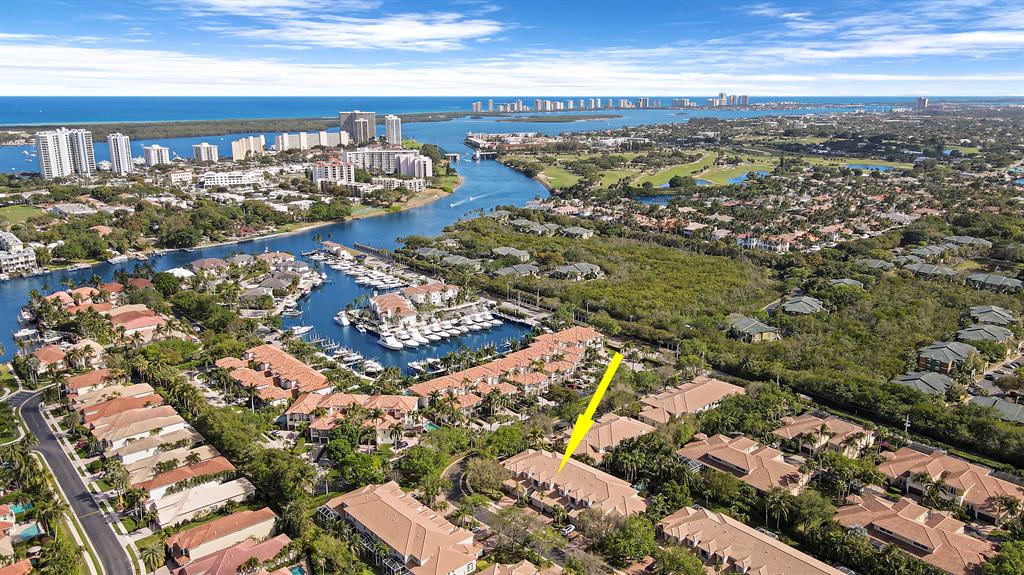 Prosperity Harbor is a gated waterfront community nestled along the Intracoastal Waterway.  New roof and flooring just installed, open floor plan, spacious  kitchen, high ceilings & crown molding, recessed lighting, private screened-in patio & garden view, newer appliances, including a gas range cooktop and double oven. Seller financing available based on owner approval.HOA includes: Cable, Internet, Insurance, Lawn Care, and more!Amenities include day docks, pool & jacuzzi, sidewalks, and 24 hour gates. Walking distance to Carmines, Trader Joes shopping center, PBG Mall, downtown Gardens, and other local restaurants/shops. 20 minutes to Jupiter, Downtown West Palm, Palm Beach and Palm Beach International Airport