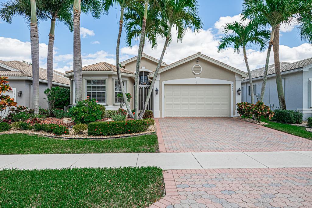 Fabulous lakefront,newly remodeled kitchen & Owners Bathroom,quartzite&porcelain! White wood shaker cabinets,gorgeous counter/backsplash, all tile throughout,completely enlarged screen lanai views the lake from everywhere! FULL HOUSE AUTO GENERATOR & ACCORDIAN SHUTTERS make this home storm ready! Full home water filtration system! Pristine! Walk to clubhouse,restaurant,6 pickleball crts, 10 tennis crts ,3 bocce ball crts,basketball putting green, tropical social pool,lap,resistance pools, indoor racquetbal&whirlpool, spa, sauna, steam,salon, full time tennis pro&shop,full time social director, shows, cards, dine inside or out at the Bistro. Premier Valencia 55+ Lifestyle community! Pride of ownership!Country club living with no equity or club dues!Community amenities are amazing! LOVE IT!