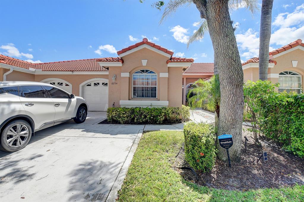 COMING SOON!! LIVE SHOWINGS START SAT 3/25. RARELY AVAILABLE IN  THE GATED COMMUNITY OF VILLA SAN REMO!! This beautifully updated villa has it all. 3 beds/2 full baths, 1 car garage and a NEW ROOF!! As you enter, you are met with volume ceilings and a stunning water view. The kitchen is open and updated with wood cabinets, SS appliances and granite counters. Offering a split floorplan with master overlooing the lake, middle bedroom can be used as an office and the 3rd bed is private near the front. All bathrooms have been update, NEW AC..San Remo is an all age GATED community offering, pool, tennis, basketball, clubhouse, fitness  playground , and PET FRIENDLY. LOW HOA