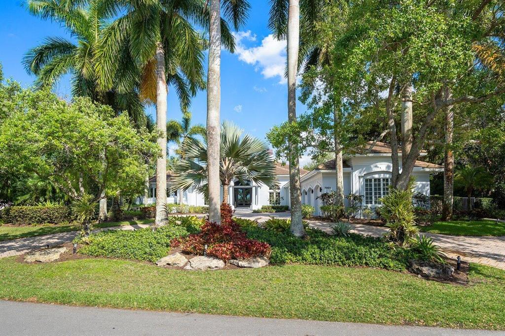 Renovated 4-bedroom 51/2-bath and Den/office custom home in Old Marsh Golf Club with Impact Glass sited on a very private 3/4 acre lot overlooking a serene 40-acre nature preserve. 5,089 sf under air, with an air conditioned sunroom that adds an additional 424 sf of living area. New flooring,  new appliances, new cabinetry, new bathrooms, new fixtures and a new pool, this home is move-in ready. Each guest bedroom has its own en-suite. The living room boasts an 18'x21' marble accent wall with a decorative electric fireplace. The custom kitchen is a chef's dream with top of the line Miele gas and electric appliances, quartz waterfall edge island and custom cabinetry. A Great Home! two walk in closets with custom cabinetry and shelving. The large and graciously appointed primary bathroom offers separate water closets, an oversize shower with rainfall shower head, and free standing bathtub. 
Old Marsh is a small and exclusive, gated golf course community, surrounded on three sides by hundreds of acres of beautiful nature preserves that will never be developed. Old Marsh contains only custom estate homes on half-acre or larger lots, with marsh, lake or golf course views. The 18-hole championship golf course was designed, and recently renovated, by the highly-renowned architect Pete Dye and consistently has been ranked one of the best in Florida. No starting times and a nationally-acclaimed caddy program enrich your experience on the course. With its recently enlarged clubhouse, its warm and friendly atmosphere and its service oriented staff, Old Marsh Golf Club has been recognized as one of the top 35 private clubs in the country, and Audubon International has awarded it certification for its environmentally enhancing design.
