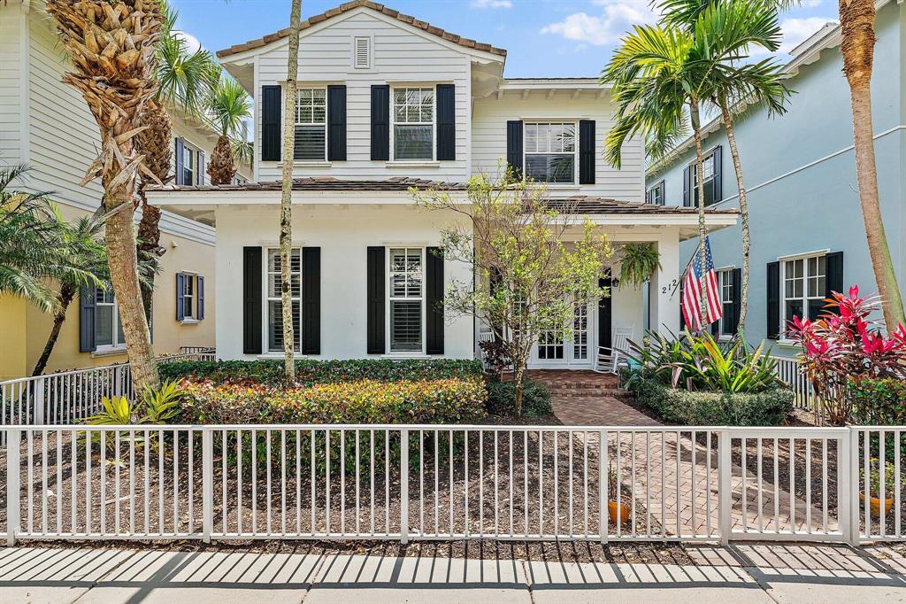 A gem in the heart of Jupiter! This stylish and elegantly designed Botanica home offers 4 bedrooms, plus a newly added den/office, 3.5 baths, and 2 car garage. The master bedroom is conveniently located on the 1st floor, with 3 additional bedrooms plus den/office upstairs. The main level features beautiful new wood like LVP throughout the living & dining areas and master bedroom. All wood floors upstairs. Many custom designer touches including gorgeous draperies, plantation shutters, woven shades, bathroom wallpaper, mosaic floor tiles and decorator lighting. Charming and peaceful all turf courtyard! 3 car driveway in back. Huge shelving racks in garage for extra storage! Brand new water heater. Directly across from the neighborhood play park. You will fall in love with Botanica's walking trails, surrounded by nature preserve and tranquil lakes. Take daily walks down the back path to Publix and Starbucks. Two blocks from Jupiter Medical Center. A short drive to fun shops, delicious dining, premier golf courses and Jupiter's gorgeous beaches.