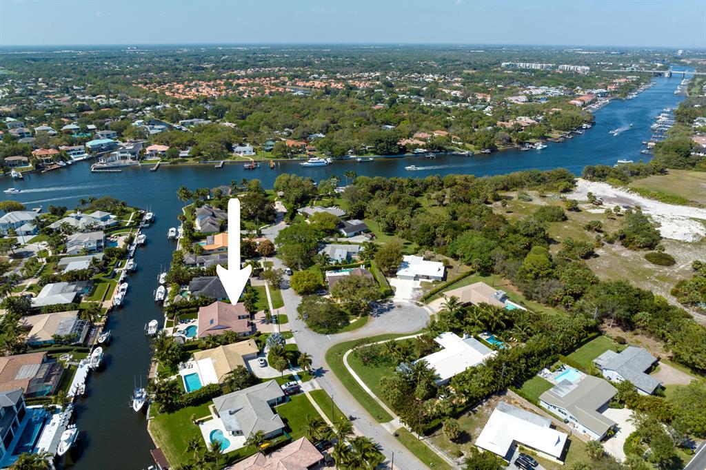 Experience south Florida living at its best in this completely renovated waterfront home with pool/spa, dock and lift in the highly sought after community of Juno Isles. 3 bedroom, 2.5 bath, den, 2 garage, pool/spa,  dock with 16k lb lift: Some the highlights include: Lot size 100 x 120, .26 acres, CBS Construction, 100' of water frontage, No fixed bridges, Circular paver driveway, Sidewalks, All impact, widows and doors, Central vac, Propane gas, Ceiling fans, Recessed lighting, Plantation shutters, Custom lighting Custom wall covering, Open floor plan, Beautiful hard wood floors throughout all living areas and bedrooms.  Kitchen has white cabinetry, pantry, Fulgor Milano appliances including 6 burner gas stove, double door refrigerator, wall oven, microwave, dishwasher and beverage cooler, quartzite counter tops with full quartz backsplash and center island, with stainless steel under mount sink. Open dining area with chandelier The family room has sliders to the lanai and pool. The den has pocket doors. The laundry room has folding area and utility sink. Master bedroom has water and pool/spa views. 
Master bath has his and hers vanities with marble counter, walk in shower, separate soaking tub and water closet. 
2 guest bedrooms, one with private access to the backyard, lanai and pool/spa with black out shades.  Guest bath has double vanity and walk in shower. Powder room with single vanity. Spacious lanai with tongue &amp; groove ceiling, recessed lighting, and ceiling fans.
Juno Isles is minutes to beaches, fishing, recreation, dining and entertainment. Easy access to major highways and Palm Beach International Airport. 

