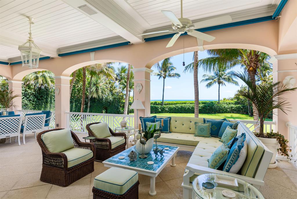 Sitting on 2 acres, 338 S Beach Rd on Jupiter Island is the epitome of old world Florida sophistication and tasteful elegance.  Completed in 2012, the three-year renovation was done to highest design/construction standards including lacquered walls, Pecky cypress millwork and Chinese Chippendale railings. Renowned Belgian landscape architect Francois Goffinet created a parterre rose garden and oversaw the installation of verdant gardens throughout plus planting of different species of palms. In addition to the 9 bedrooms in the main house each with ensuite bathroom, there is a separate guest house and immense pool cabana with an outdoor kitchen and two full changing/bathrooms.