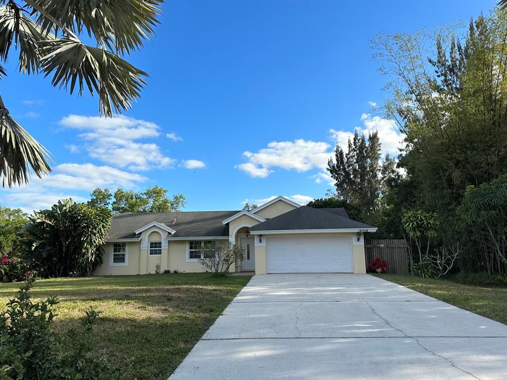 ***1.14 ACRES***CLEAN AND CLEAR LAND***NO HOA ******// SEMINOLE PRATT & E PREAKNESS ***FRUIT TREE LOVERS PARADISE*** WELL MAINTAINED 3 BEDROOM 2 BATHROOM 2 CAR GARAGE WITH POND*** MANGO//AVOCADO//BANANA//LEECHEE TREES***VEGERABLE GARDENS AMAZING BACK YARD FOR ENTERTAINING ON 1.14 ACRES IN LOXAHATCHEE!!  UPDATED APPLIANCES! * **. MASTER SUITE WITH WALK IN CLOSET SHOWER & TUB **. THIS BEAUTY EAT IN BREALFAST NOOK OVERLOOK BIRDS, TREES AND WATER *** LOTS OF NATURAL LIGHT **.  NO HOA- BRING THE RV, BOAT, TRAILER & HORSES *