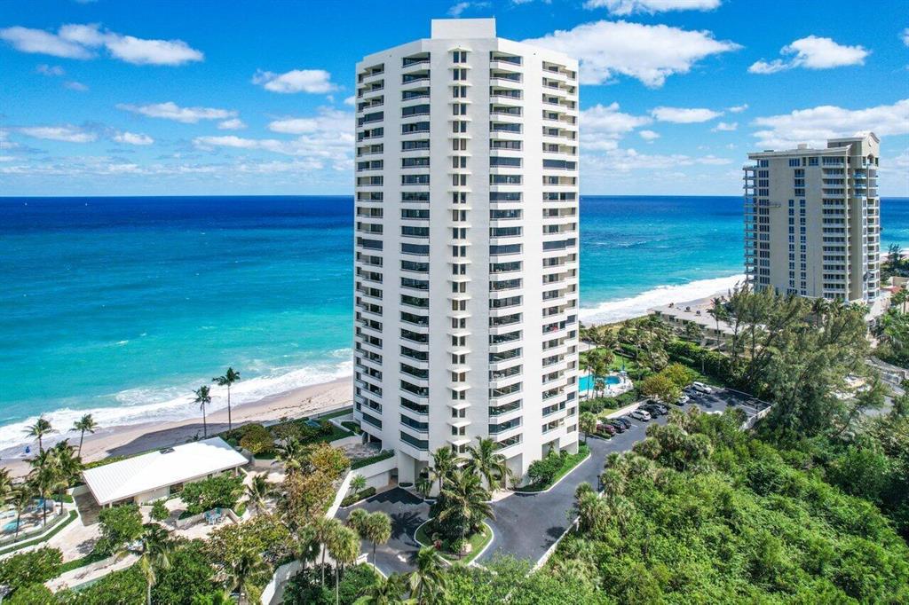 Take your breath away views! See sunrises at the beach and sunsets from your balcony. This light and bright spacious 2/2 condo offers expansive intracoastal views from every room and ocean views too. Split floorplan with large bedrooms with walk-in closets. Full laundry room with utility sink. Tandem garage parking space that accommodates two cars. Large separate storage cage on lower parking level plus bike storage. Just steps to the beach, plus 2 pools, 2 hot tubs, fitness center overlooking ocean, sauna, shuffle board, tennis, pickleball, billiards, gas grills, fenced dog park. 14 Acres with 900' walkway along seawall with glass railing. Ample guest parking and electric car charging stations. Close to airport, shopping, dining, golf, and much more.