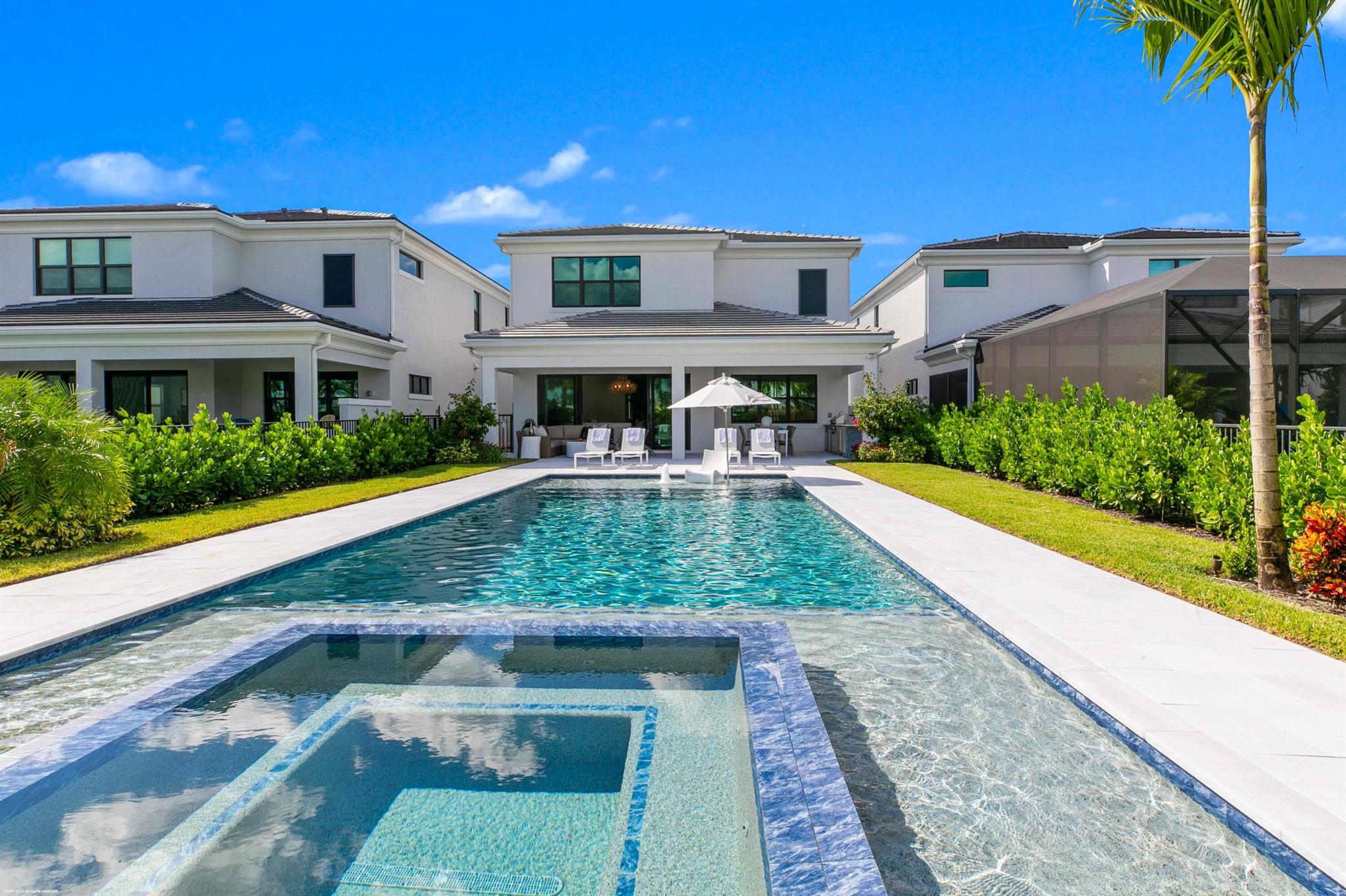 Brand New & move-in ready!  This expanded Hudson floor plan boasts an open floor plan with stunning appointments, 3 car garage and incredible backyard!  The custom pool & spa with tropical landscaping are the backdrop, featuring surround sound throughout (inside and out) this residence is perfect for entertaining.   The kitchen is the heart of the home, featuring a large island, quartz counter tops, commercial grade gas appliances, reverse osmosis at the sink, wine cooler & fabulous walk in pantry with plenty of counter space and storage.   The family room is the perfect place to gather with family & friends while over looking the tropical views of the backyard with custom pool, heated spa & full summer kitchen.  The second floor is the perfect place to relax & 3 Ample guest rooms, 2 guest bathrooms and very spacious laundry room complete the second floor.  The office is tucked away downstairs with double doors and powder room near by.
Other feature include- over sized private lot, expanded floor plan, over size garage with 3 doors, beautiful wood staircase, over sized sliding glass doors to bring the outdoors in, expansive lanai, full summer kitchen, large custom pool with spa &amp; sun shelf, upgraded appliance package &amp; much more!