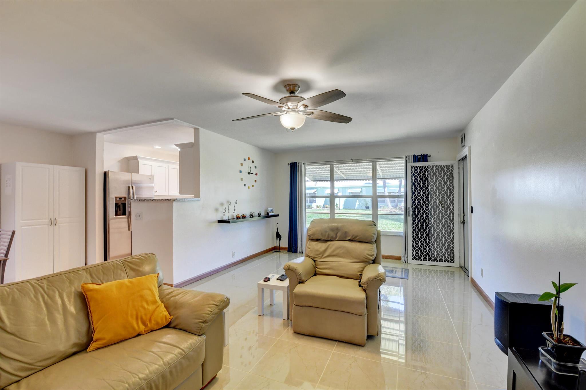 Pine Point Villas Condominiums is an Incredible gem in Boynton Beach. Features cozy villas in a well-established community that continues to attract 55 and over residents. The entire community was painted and roofs were redone in 2021 & 2022. This charming and pristine, turn-key 1 bedroom, 1-and-a-half-bathroom residence, with a bonus sunroom is spacious and bright with ceramic tile flooring throughout, updated kitchen cabinetry with newer appliances.  Newer A/C, fridge, microwave, 3 ceiling fans, electrical panel, & LED recessed lighting. Laundry room located in each building 4 units per building. Community Clubhouse features activities to fit any lifestyle. Heated pool, shuffleboard, billiards, card room and social gatherings. Minutes from the beach, I-95, PBIA, malls & Rosemary Square.