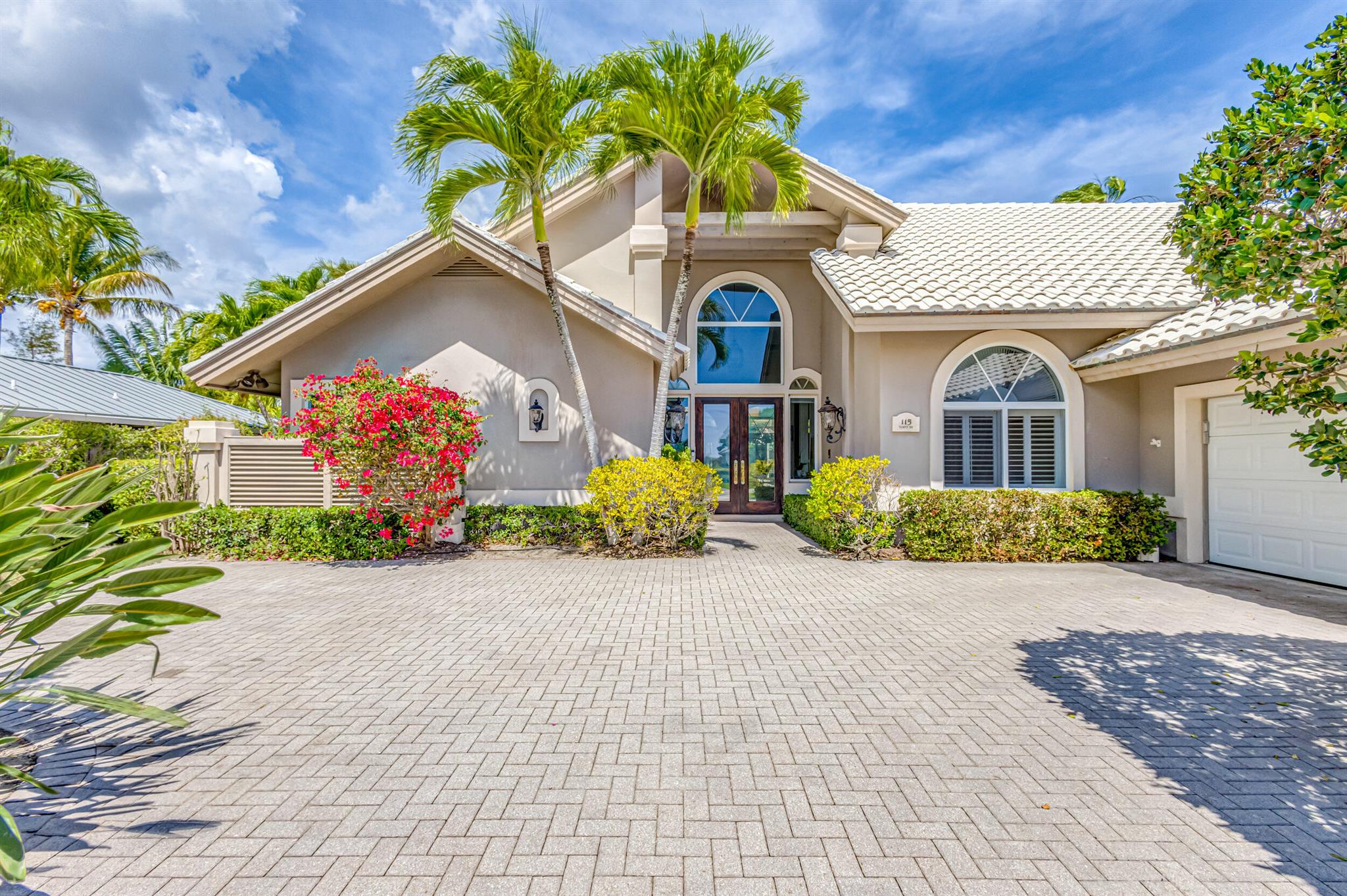 Live just steps from the beautiful beaches of Jupiter! Beautiful 4 bedroom /4.5 bath CBS pool home is situated in the relaxed coastal community of Olympus with deeded beach access!! Enjoy swimming in your large lap pool or just relaxing in your oversized screened lanai and enjoying the fresh ocean breeze, day & night! The open & airy main living area provides an incredible flow to the screened lanai/pool, perfect for those who love entertaining. Desirable 1st-floor master suite has beautiful pool views w/sitting area, and a private entrance to the lanai. Three guest rooms are very generous in space, of which 2 with private en suites. Propane gas service supplies; your home generator, cooktop, hot water, and pool heater. Welcome home to one of the most sought after S Florida communities