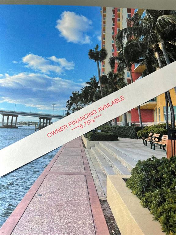 This beautifully appointed condo is offered with possible owner financing as low as 5.3/4%** Beautifully  finished 3 bed 3 bath intracostal/ocean view condo only 10 minutes away from Palm Beach inlet. Boat Storage up to 48' available with dry storage. Jack Nicholas Golf, Shopping, PBI and restaurants only 15 minutes away.The $5,000,000 state of the art amenities including new tennis, pickle ball and Pool with spa and whirlpool with a view of Peanut Island are almost finished and just waiting for you. The huge exercise facility is equipped with sauna and steam, lockers and shower rooms(assessment has been paid in full) Lowest monthly fees in the area for this amazing life style. Manned security and pets allowed.HOA includes water, building ins, basic cable, manned gate and amenities.