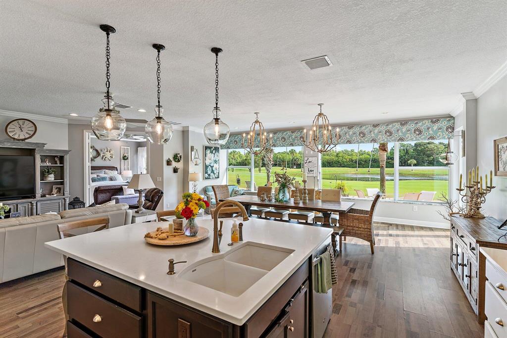  Welcome to your dream home in Eastpointe Country Club - a golfer's paradise!  This home offers 3 spacious bedrooms, PLUS DEN, including a luxurious master suite with a spa-like bathroom, 2 walk-in closets, and wall to wall windows overlooking the golf course. This stunning property was built in 2014 and offers luxury living at its finest, featuring an open and spacious floor plan, high-end finishes, and breathtaking views of the golf course and pond. Enjoy the best living featuring a recent floor plan expansion, brick paver patio and professional landscaping. Additional features include: gourmet kitchen, 10' ceilings, crown molding, tray ceilings, high end lighting upgrades and all impact windows and new air conditioner.
Located in the heart of Palm Beach Gardens, this property offers easy access to shopping, dining, and entertainment. 
Don't miss your chance to own this incredible and unique property - schedule your private showing today!

The Pointe opening in late Spring 2023 https://youtu.be/hQI7bZvi8AM Eastpointe Country Club is Palm Beach Gardens' best kept golf community featuring two 18-hole golf courses, with OPTIONAL golf course membership.
Enjoy carefree living with lawn maintenance and cable included in HOA. New clubhouse opening May 2023, including new pool, fitness center, pickleball courts, and dining facilities. Minutes to downtown Palm Beach, Gardens Mall, and Palm Beach Airport. HOA monthly fees: $236, POA $298, Mandatory social membership: $383.