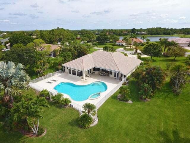 WOW! What a house! One of the best estate lots in Bay Hill. South exposure with panoramic golf and lake views. Huge 50' wrap around resort styled pool & spa. Marble floors in living areas. Hand scraped wood floors in massive 21' master bedroom with coffered ceilings. Master bath features dbl. vanities, spa tub, bidet and frameless glass shower. Located on a quite cul-de-sac in gated/guarded community of 1 acre estate lots. Stately office with built in wall unit. Contemporary European  elegance.Two AC units, one replaced in April 2023 and one is 10 years old. Garage features tiled floors, ton's of storage cabinets and a Tesla charging outlet.
