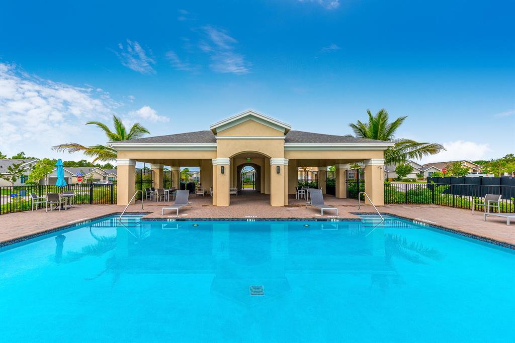 Owners spared no expense when upgrading this new construction home less than 3 years ago. This home boasts beautiful driftwood plank tile, upgraded cabinets, & quartz countertops. The coastal vibes of this home does a fantastic job of emulating the coastal culture & heartbeat of Jensen Beach. Enjoy privacy and gorgeous sunsets from the backyard of this home, which is situated on an unbuildable nature preserve. To top it off, this home is located near the community pool, mailboxes, and overflow guest parking.