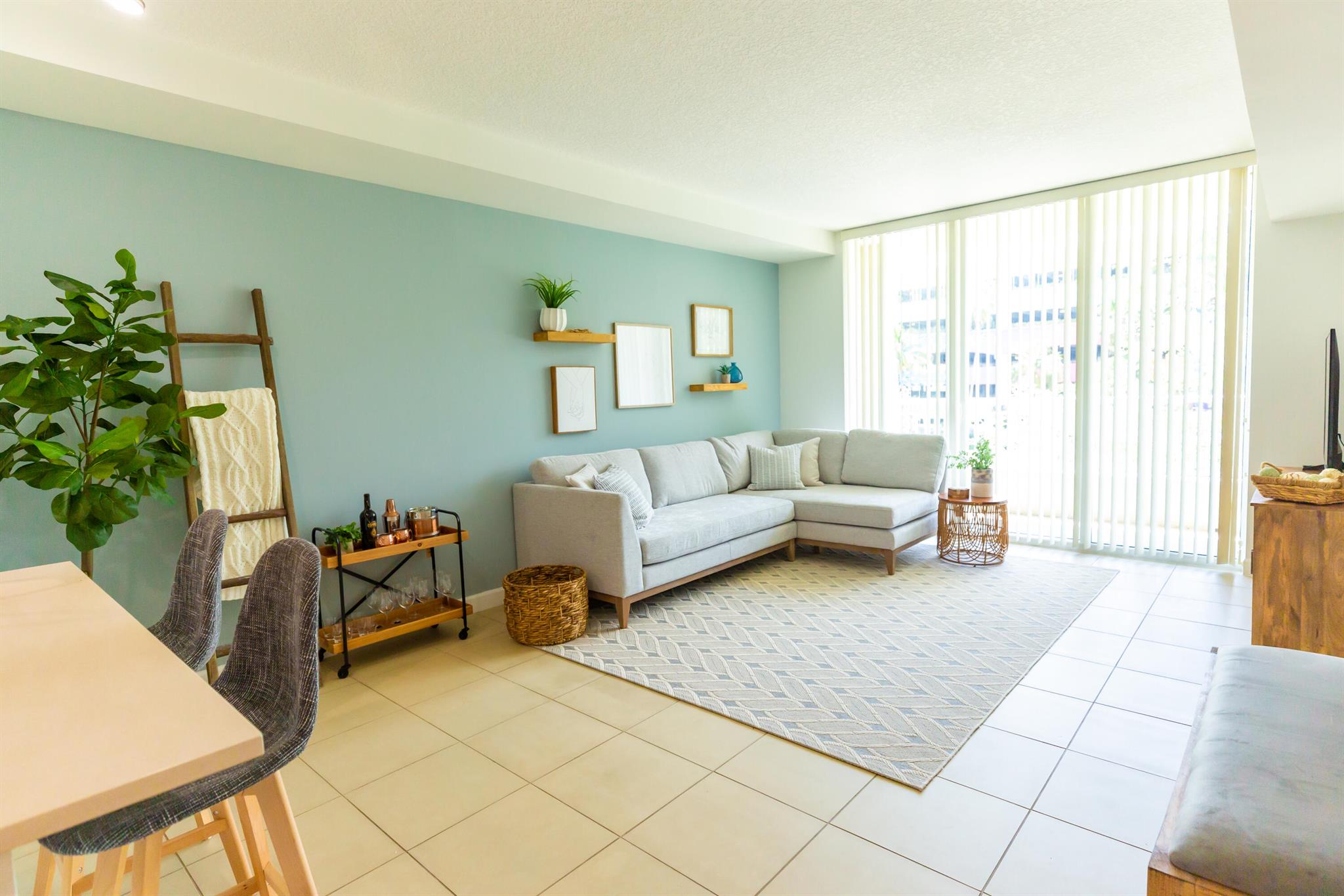 ONLY AVAILABLE MONTHLY UNTIL DECEMBER 15 ALL UTILITIES INCLUDED. This 1 bedroom+den, 1 bathroom, light and bright unit is everything you have been looking for in the city of West Palm Beach. Fully furnished and ready for occupancy off season, seasonally, or annually. Includes 1 parking space. Featuring an updated bathroom, vinyl and tile flooring throughout, quartz countertops and stainless steel appliances with contemporary high end furnishings. Inquire for seasonal and off season pricing. City Palms offers valet parking, a 24 hour manned lobby, fitness center, community pool and is walking distance to Rosemary Square, the intracoastal and Clematis street  Pets welcome:)