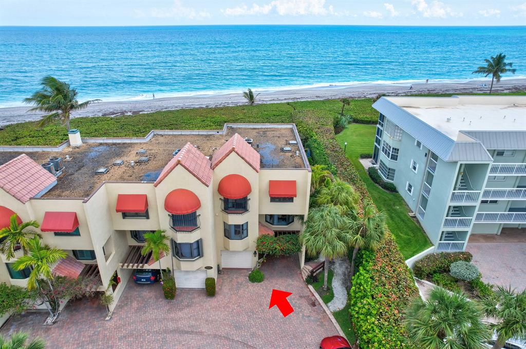 Indulge in the perfect blend of luxury and comfort. Rare opportunity in this desirable oceanfront townhome community of only 39 units. Gorgeous direct oceanfront townhome, well-curated with elevated design. A perfect ocean oasis in the heart of exclusive Juno Beach. True coastal lifestyle with the ocean steps away. Loads of sunlight with southeast exposure and blue ocean views from main living areas. Casual yet elegant with sophisticated charm. 1st FL - inviting family room with custom bookcases, laundry room and full bath. Can be used for an extra bedroom. 2nd FL - open kitchen w/ quartz countertops, Miele appliances and European cabinetry. Eat-in kitchen area, dining room, living room w/ custom cabinetry and marble powder bath. Living room opens to an expansive deck overlooking the ocean 3rd FL - Primary bedroom with luxurious stone bath, walk-in closet and oceanfront balcony to enjoy ocean breezes all day. Gracious ensuite guest bedroom with attached office and private balcony. 

Luxurious finishes throughout including hardwood oak stairs and flooring, glass 3-story stair rail, custom built-in shelving, marble and stone baths and exquisite window treatments. This exceptional three story residence lives like a single family home and has garage + carport, hurricane impact windows and doors, 'green' construction where possible, whole house water filtration system, new electric and plumbing and two new AC systems with UV lights improving indoor air quality.

Cote de La Mar is a boutique community with only 39 residences nestled between Pelican Lake and the Atlantic Ocean. Juno Beach is 20 minutes from Palm Beach &amp; surrounded by great restaurants and The Gardens Mall. The newly renovated North Palm Beach Country Club down the street is open to the public and offers exceptional golf, tennis &amp; dining facilities. Juno Beach is home to the most beautiful beaches in South Florida and home to the Loggerhead MarineLife Center &amp; Manatee rehabilitation &amp; hospital. Convenient to both Palm Beach Int'l and Ft Lauderdale airports.