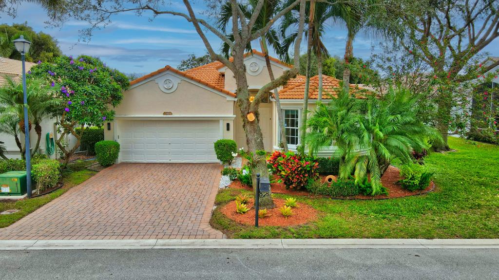 Completely renovated & remodeled lakefront home with long lake views of the Clubhouse. Finished with beautiful, elegant, neutral  contemporary quartz waterfall countertops, LVP flooring, stainless appliances and modern cabinetry in the kitchen and baths, It's like buying new construction!The house boasts an open split floor plan w/vaulted ceilings and a great room with an oversized screened patio. Hurricane shutters & hurricane rated front doors.Avalon Estates has a magnificent, redecorated clubhouse with an olympic sized pool, spa, fitness center, pickleball & tennis courts, card rooms, art studio, bocce ball, billiards and more. This active community have events, shows and concerts throughout the year for your entertainment!