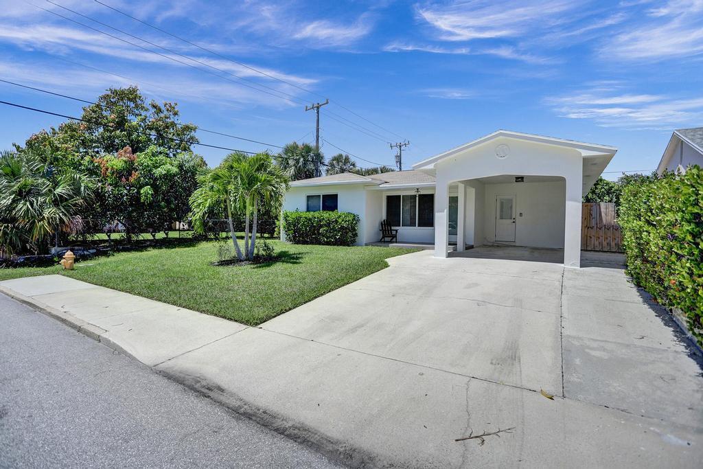Come and see this recently renovated 2 bed / 2 bath ranch style home with NO HOA in the desirable College Park neighborhood of Lake Worth Beach. Located East of Federal Highway and just an 8 minute drive from the beach, this beautiful home has full impact windows and doors and a large fully fenced-in backyard with tiled patio and plenty of space for a pool. Other notable features include hardwood floors, newer appliances (1 year), quartz countertops, recessed lighting and bonus FL room.