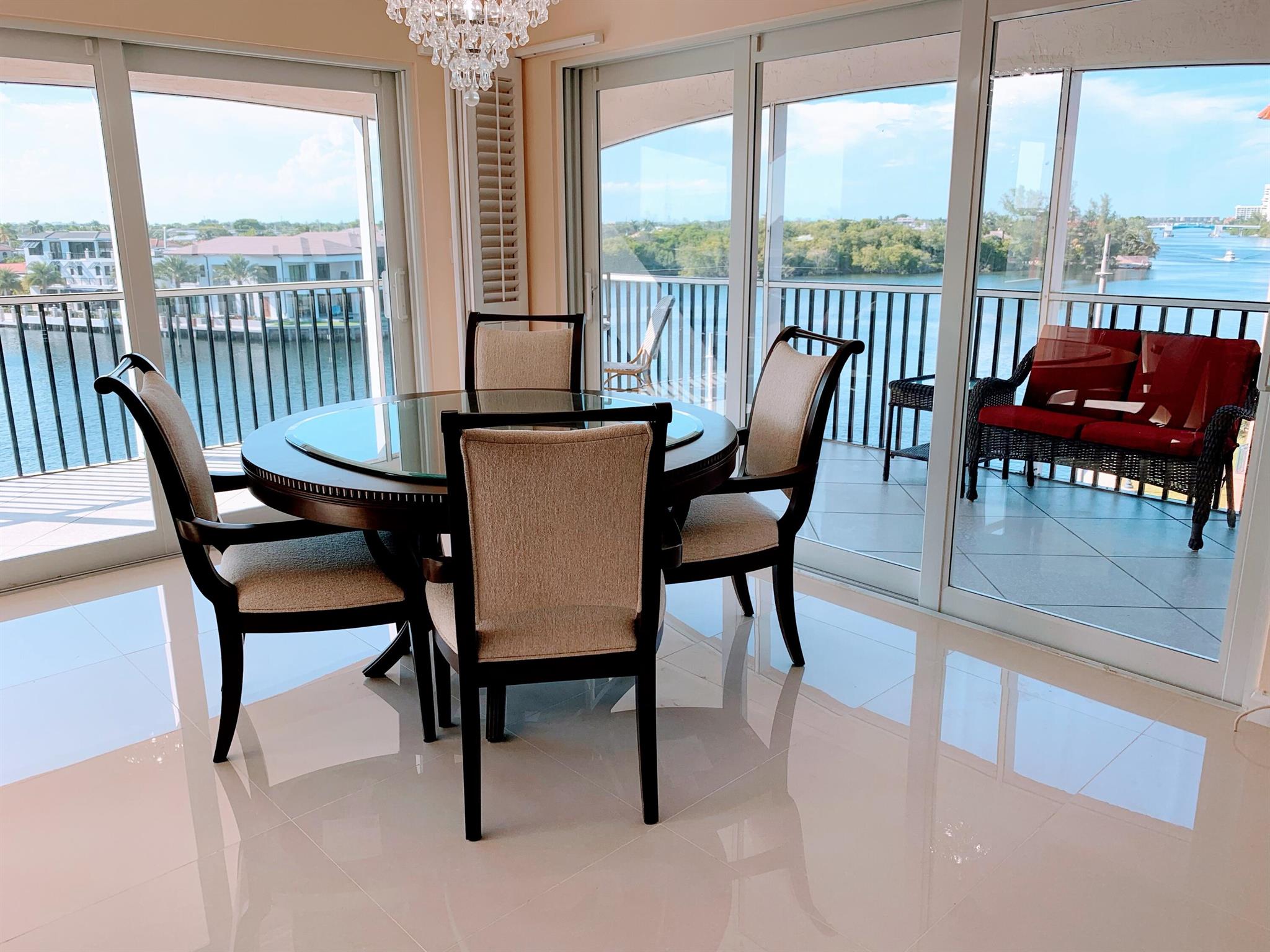 This stunning, furnished 3-Bedroom 2.1-Bath Corner Condo boasts Panoramic Intracoastal Views from EVERY room except the 3rd bedroom. This condo offers 2033 sq. ft of living space filled with natural light and a large Wrap-Around, Screened-in Balcony with Intracoastal Views from every direction.  Remodeled kitchen with corian counter tops. Laundry/Utility closet with stack washer/dryer. Large primary bedroom with Intracoastal Views, walk-in closet and en-suite bathroom. The other 2 bedrooms share the updated hall bathroom.  Impact Glass and doors. One assigned garage space and a large storage locker on the same floor!  Ideally located!  Raphael lobby will have 2 NEW Elevators soon! San Remo amenities include Manned Security Gate, Marina, 425' of deeded private beach,
