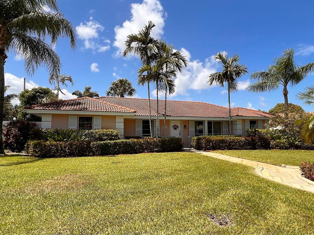 South Florida living at its finest in this delightful home located in the coveted Juno Isles community.  With a hint of Tuscany, the house features an open kitchen, attached dining and living areas, three spacious bedrooms, a den with pecky cypress ceiling, and a semi-detached garage. Add to that a fantastic covered summer kitchen space, perfect for outdoor living and entertaining, right beside a spacious back yard, open pool deck, and mango tree.  Juno Isles is a quiet well-established community of 337 homes, with HOA dues under $150/year.  Shopping and restaurants abound, and there are 2 boat ramps (and the Atlantic Ocean) less than a mile away.