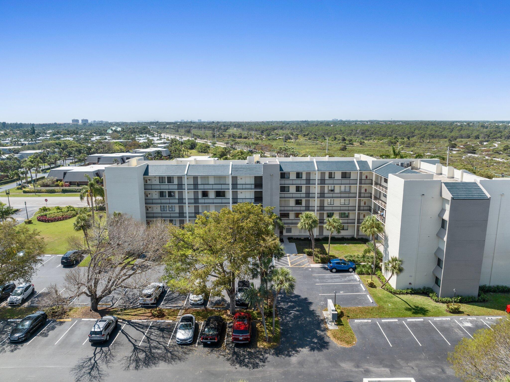 This desirably located 3B 3B condo is approximately 500 yards to the beach in the lovely Jupiter Ocean and Racquet Club. With over 2000 square feet of living, the condo comes with one of only four sought-after covered parking spaces. The third bedroom downstairs can be utilized as an office-den, extremely private. Newer window treatments inside and storm shutters. This is a MUST SEE!