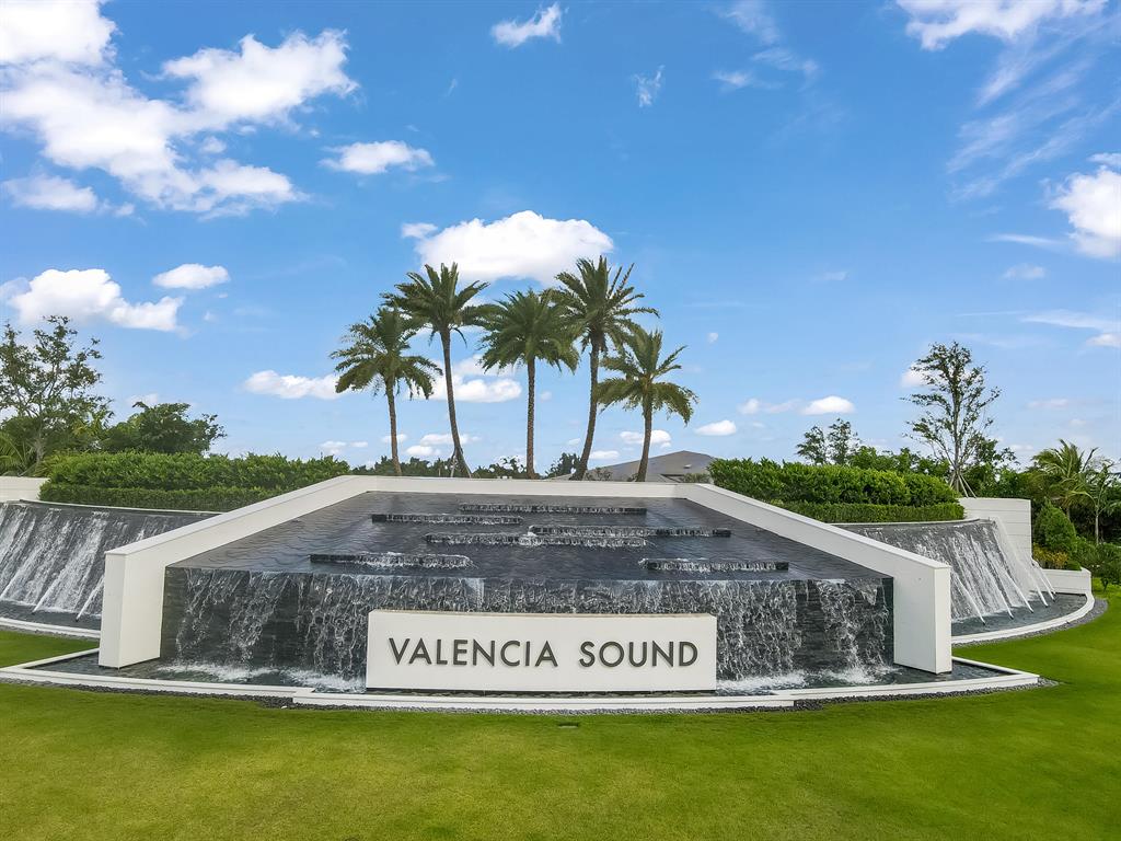 An opportunity to purchase a beautiful 3 BR 3 BTH pool home in the prestigious Valencia Sound community.   This magnificent turnkey Piazza home, with glass double front entry, pool and screened in patio, is situated on a picturesque lake with numerous extras and upgrades.  Residents have access to fabulous amenities including a beautiful new clubhouse with a full restaurant, bar and lounge, multiple pools, tennis, pickleball, fitness center, bocce ball and much more.  The model kitchen, with quartz countertops, has pull-out shelving, glass cabinet doors, and an eat-in kitchen with custom cabinetry.  Great room has a stunning built in with a wet bar and wine cooler.  The primary bedroom has a gorgeous built-in with glass shelving.  There is porcelain tile throughout all living (see more) areas and carpet in bedrooms.  Bathrooms are upgraded with beautiful fixtures and listello tiling.  The atrium in the Piazza model is one of a kind, as it is large enough to sit in and enjoy.  EXTRAS: crown molding, recessed lighting, upgraded faucets and showerheads, bathroom mirrors to ceiling with frames, upgraded toilets, custom closets, intercom system, heated saltwater pool with filtration system and auto drain, patio fans, landscaping, motorized window treatments, garage cabinetry, epoxy flooring and slop sink, security lighting, extra cabinets in laundry room with dry bar, lighting fixtures throughout, extra niche in primary shower, upgraded attic insulation, upgraded A/C and more...
Professional photos coming soon!