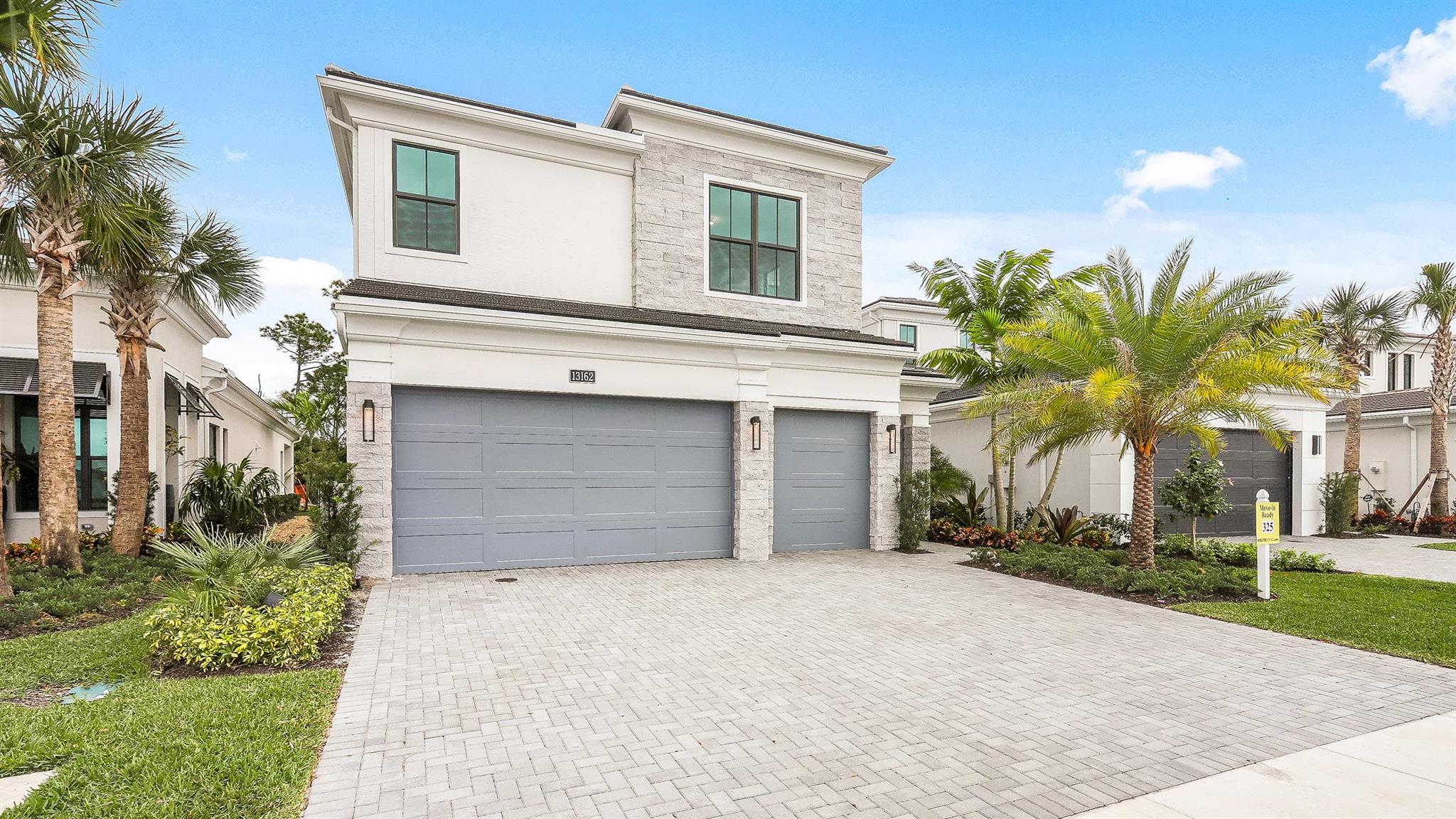 ** UNDER CONSTRUCTION** Stunning 2-story home featuring 4 Bedroom, Den, Loft, 3 Full and 1 Half Bath, a 3-car garage, and Lanai with beautiful preserve views. The Island Kitchen is thoughtfully designed with grey cabinets with crown moulding, a quartz countertop and backsplash, a 30'' built-in oven, 36'' cooktop monogram, and a 36'' wall-mounted hood. The large sliding glass doors in the Family Room fill the main living area with natural light. The second floor boasts all Bedrooms and the spacious Loft with tray ceilings. The Owner's Suite is complete with triple windows and tray ceilings, and the Owner's Bath has a frameless walk-in shower with a seat, dual vanities, and two separate walk-in closets.