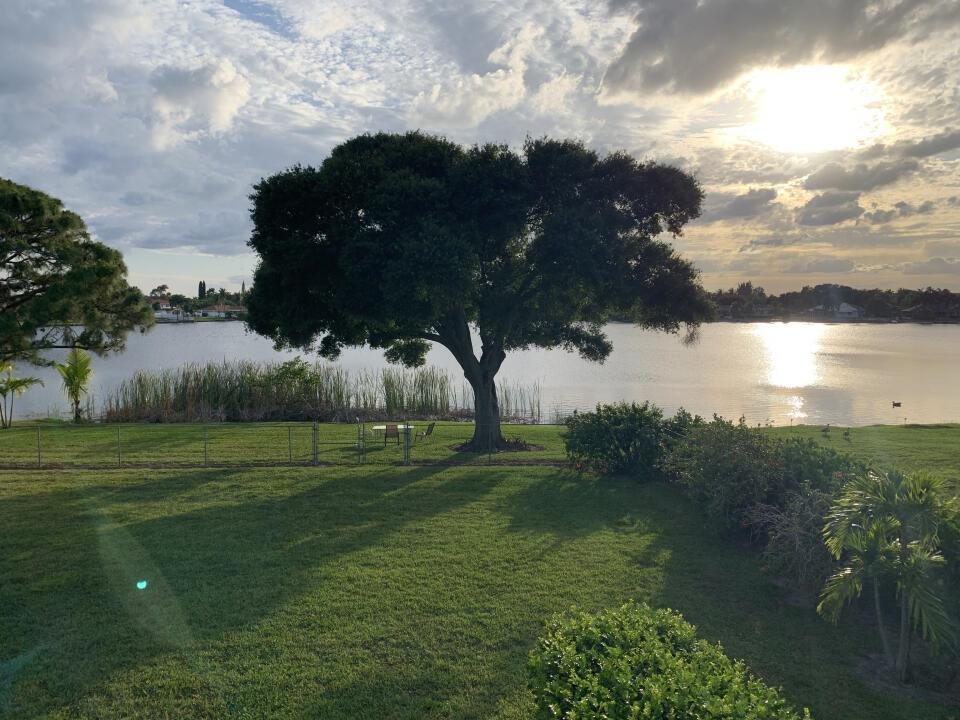 Beautiful remodeled hidden gem lakefront home on almost a half acre lot minutes from downtown West Palm Beach. Lot is 100 feet wide by 185 feet deep. This charming home backs up to a crystal clear, spring fed, 10 acre lake in a beautiful neighborhood minutes from everything. Come enjoy the gorgeous views from the huge fence backyard . Lake Patrick Estates is a wonderful neighborhood of only 62 well kept homes with no thru streets , it offers a peaceful secluded feeling yet is only a few minutes to the beaches and downtown. Homes rarely come up for the sale in this coveted neighborhood. The home features 3 bedrooms, 2 bathrooms, ample closets , hurricane impact windows and doors, an open floor plan with breathtaking forever views from the living room , den, kitchen and bedrooms.
