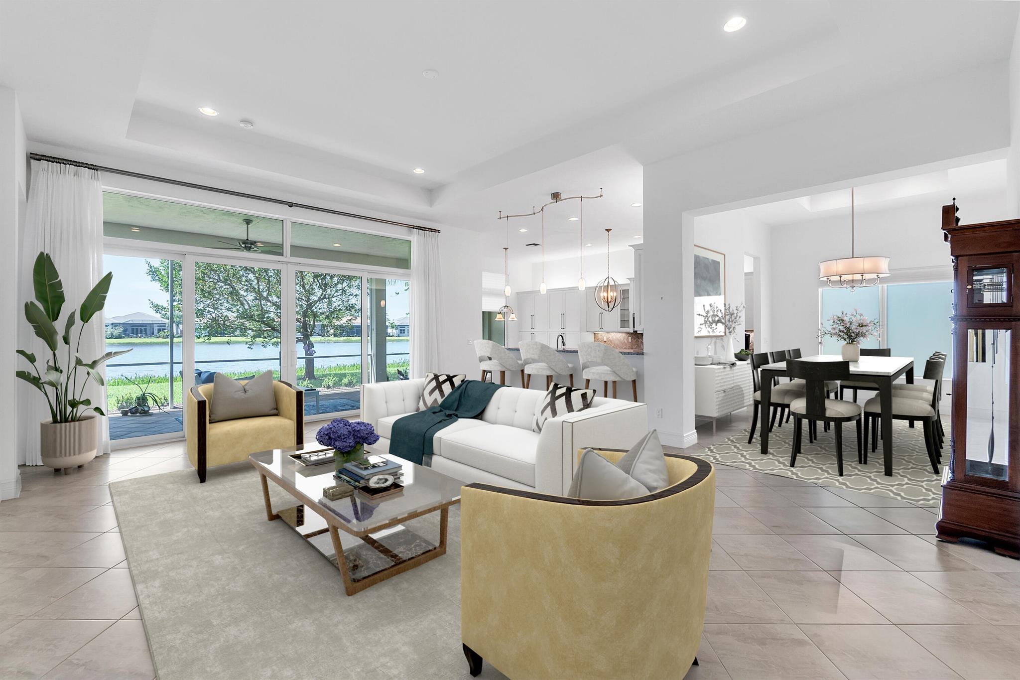 This bright, beautiful home is situated on an oversized, serene lake lot! Enter thru the private courtyard. This stunning home has full impact glass & a 3 CG. Upgrades feature high coffered ceilings, tile on the diagonal, closet built-ins, Plantation shutters & more-$200k in upgrades. The kitchen boasts custom white cabinetry, an island w/ wine cooler, induction cooktop, granite counters, a large pantry & a sizeable breakfast area overlooking the beautiful lake! The formal DR is perfect for entertaining. Wake to the soothing lake view in the spacious primary suite w/ custom walk-in closets. The primary bath offers a spa like soaking tub. The 2nd bedroom has a full ensuite bath & walk-in closet. The 3rd bedroom is HUGE & could even be used as a great office, gym or whatever you want! This room has an additional separate entrance from the courtyard! Take in the peaceful lake view from the large, covered lanai. This 'Caroline' model home is the perfect balance of luxury &amp; function! The resort-like clubhouse is just a few minute walk. Valencia Bay is a gated Active Adult Community with world class amenities; take advantage of the Caf+¬, bar, numerous pools, fitness center, grand theatre-ballroom, classes/trips, social events, tennis w/ pro &amp; pro shop, pickleball, card rooms, arts &amp; crafts studio, catering kitchen &amp; demo studio, basketball, bocce, gathering areas and more! Ideally located close to great shopping, restaurants, hospitals, golf, beaches, major roadways, and airports.