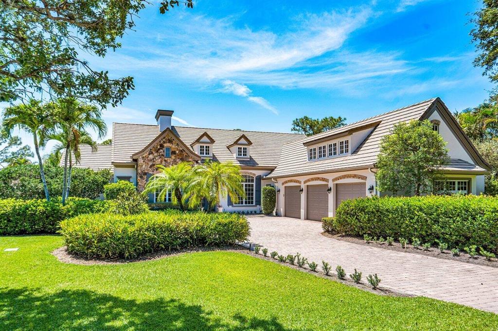 This custom designed 4 bedroom 4.5 bath home sits on more than two-thirds of an acre in the prestigious Old Marsh Golf Club and overlooks a pristine nature preserve that will never be developed.  Enjoy striking views from the living room, the kitchen, the family room and the owner's suite through window walls of glass that open to the inviting heated pool and spa and the acres of natural beauty beyond.  The outdoors beckons on the covered lanai that houses a summer kitchen and features phantom screens that can be raised and lowered to suit your needs.  Each bedroom features a walk-in closet (two in the owner's suite) and its own ensuite bath.  And there is plenty of storage space, including a 600 square foot ''Florida basement'' above the full three car garage. The attention to detail in building this home is reflected in the thick crown molding, volume ceilings, marble floors, granite countertops, wood and glass cabinetry, designer fixtures and custom window treatments throughout.

Then, of course, there is Old Marsh itself, a small and exclusive, gated community, tucked away and intimate, surrounded on three sides by hundreds of acres of beautiful nature preserves that will never be developed. Old Marsh contains only custom estate homes on half-acre or larger lots, with marsh, lake or golf course views. The 18-hole championship golf course that meanders through the community was designed by the highly renowned architect Pete Dye and consistently has been ranked one of the best in the United States. No starting times and a nationally acclaimed caddy program enrich your experience on the course. Old Marsh Golf Club, with its recently enlarged clubhouse, its warm and friendly atmosphere and its service oriented staff, has been recognized as one of the top 35 private clubs in the country and Audubon International has awarded it certification for its environmentally enhancing design.  All this and location too.  Old Marsh is just minutes to the beach, the airport, shopping, restaurants, cultural venues and fine public and private schools.

A winning combination - a custom built home on a picturesque lot in a safe and convenient community.  Call today for a tour.