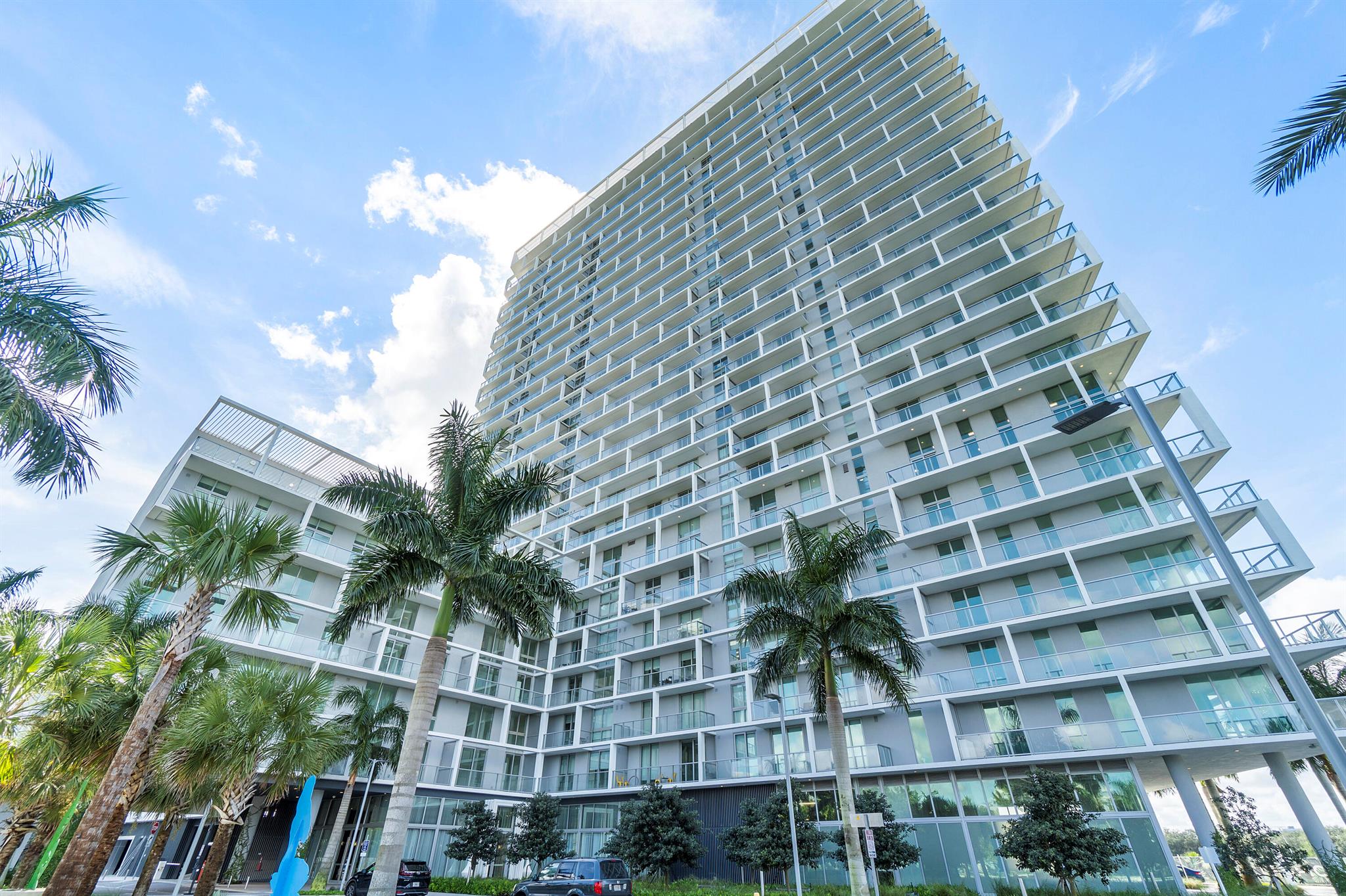 Spacious 3 Bedroom 3 Bathroom Condo with a Den in One Metropica. The tower boasts breathtaking views and was designed by world-class designer YOO and architecture by Chad Oppenheim. European-style cabinets, white quartz countertops with porcelain tile floors, and premium Hansgrohe fixtures throughout the unit. Resort inspired amenities include state-of-the-art gym, spa, sauna & steam room, business center, kid's room, party room, club room, guest suite, infinity edge pool, elevated jacuzzi, BBQ area, 2 tennis courts, 24 hour security & valet. 2 Parking Spots, Line 1 floorplan