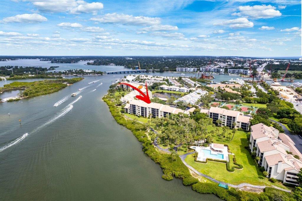 MUST SEE. Unrivaled waterway living in the prestigious gated community of Jupiter Harbour. This 2BR/2BA, luxury condo is immaculate & move-in ready after undergoing a full renovation in '21 & meticulous modern/coastal design completed in '23. Easily converted back to a 3BR. It's located on the ground level with direct intracoastal waterway & sweeping tropical landscape views, assigned covered parking, & separate storage. Enjoy coastal living with open-concept kitchen, dining, & living room, alluring new finishes throughout, stunning high quality planked natural wood flooring, new lighting, custom millwork cabinets/moldings/shelves/doors, modern tile, white quartz countertops, custom kitchen & baths, Samsung & LG appliances, custom window treatments, freshly painted, and more. Luxury furnishings &amp; decor sold separate if desired. Jupiter Harbour features a 24-hour manned guard gate, resort-style pool, tennis &amp; pickle ball courts, tree lined walking paths, private beach launch for paddle boarding / kayaking, &amp; on site management. Conveniently located within walking distance of many of Jupiter's exclusive waterfront restaurants, shopping, &amp; entertainment.
