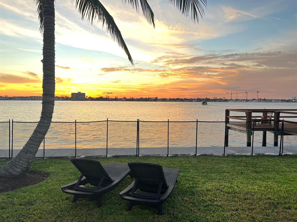 Incredible opportunity to build your dream home on this beautiful rare direct intracoastal lot! you'll have the advantage of enjoying breathtaking sunsets and easy access by boat to the Palm Beach Inlet, Munyon Islands, Peanut Island and Sailfish Marina Resort.  Minutes to some of best deep-sea fishing on the East Coast as well as only being 55 nautical miles from the Bahamas .  Seller has already invested $50,000 in blueprints for a custom home with over 4300 sq. ft of living space and over 5800 sq. ft of total area as well as recently replacing  89 ft of seawall, giving you  solid foundation for creating your ideal residence. With such a unique and well-positioned lot, you have the potential to create a truly remarkable and luxurious home that maximizes the stunning surroundings. Whether you envision a contemporary design, a Mediterranean-style villa, or any other architectural style, this location offers an excellent canvas to bring your dream home to life.  It's also worth noting that the proximity to shopping, restaurants, and golden warm sandy beaches that Singer Island is known for is all your fingertips, as well as being conveniently located to the Palm Beach International Airport.  NOTE: price is for lot and blue prints only, pictures show potential possibilities.