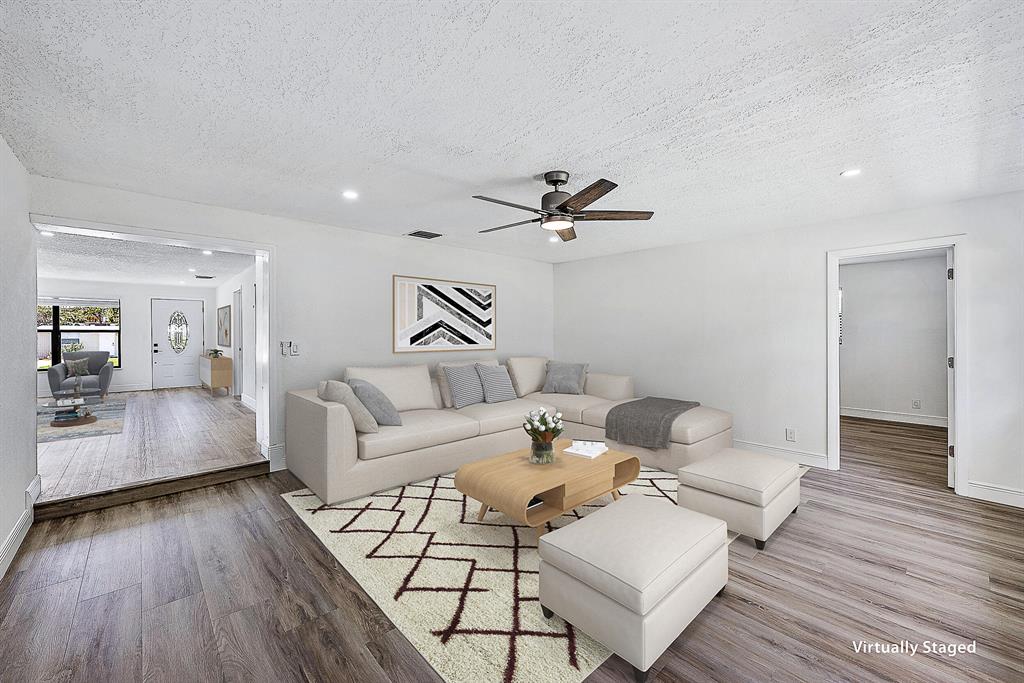 Recently updated home with NO HOA and convenient location to the best shopping and food in Palm Beach Gardens! This 5-bedroom home's updates included kitchen, bathrooms, flooring, paint, fixtures and more. Spacious backyard has lots of potential to become a tropical oasis. Very close proximity to the Gardens Mall, Downtown at the Gardens, Whole Foods, Trader Joe's, and I-95. Also close to Juno beaches and a boat ramp. Come make this home your own!