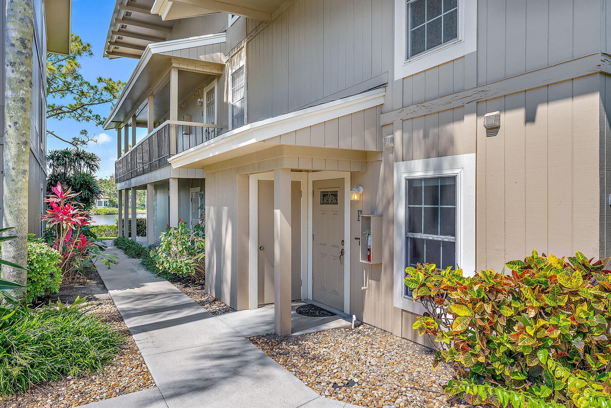 Welcome to 9170 SE Riverfront Terrace Unit H in Jupiter, FL! This STUNNING two-story 2-bedroom, 2.5-bathroom condo has over 1,200 square feet and is situated in the prestigious Riverbend Country Club.  Boasting IMPACT sliders, and NEW appliances, and breathtaking views of the Loxahatchee River. As you step inside, you'll be immediately struck by the spaciousness and overload of natural light! Continue into your new home, you have a half bath to your left and to your right you have the kitchen.  Your sizable kitchen has all stainless steel appliances, an LG side by side InstaView fridge along with a new dishwasher and microwave! The kitchen also features ample storage and counter space, an under counter wine fridge, and a passthrough window where you can see through to your dining and living areas and out to one of your two screened-in patios overlooking the picturesque blue water of the Loxahatchee River. 

Your open dining room leads straight into your large and expansive living room that has sliding glass doors leading out to one of your two screened-in patios. Your beautiful outdoor space provides a tranquil and serene living environment overlooking the beautiful blue water from the Loxahatchee River and is the perfect place to enjoy your morning cup of coffee or a glass of wine at the end of the day. 

Head upstairs to find the primary suite, guest bedroom and second full bathroom. Your LARGE primary suite offers TWO large closets, a generous sized ensuite with a built-in vanity and a bath/shower combo, as well as a PRIVATE screened-in balcony overlooking lush greenery and the beautiful blue water. The guest bedroom is generously sized offering a sufficient amount of storage and letting in an abundant amount of natural light. 

Other notable features include impact sliders to ensure your safety during hurricane season AND new appliances, including a new hot water heater, dishwasher, washer, dryer, and microwave that all provide peace of mind and convenience.

As a resident of Riverbend Country Club, you'll also have access to a variety of luxury amenities, including golf course, tennis courts, a fitness center, and much more!

Located just a short drive from world-class dining, shopping, and entertainment in Jupiter and Palm Beach Gardens, this condo is perfectly situated for upscale living in one of South Florida's most sought-after locations.

This TURN-KEY unit is ready for its new owner and can be sold fully-furnished. Don't miss out on this incredible opportunity to enjoy the upscale living environment of Riverbend Country Club. 
