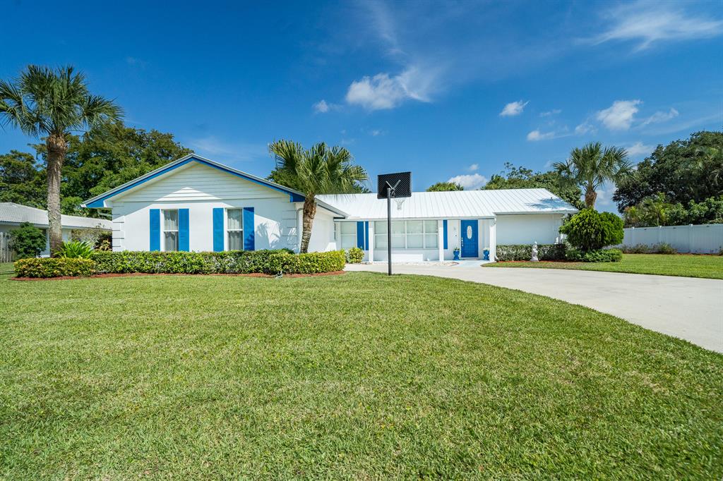 Very well maintained single story home 4/2/2 in very desirable part of Palm Beach Gardens.  Bring your boat and/or RV - NO HOA. House has metal roof and Concrete Block construction.  Interior freshly painted, entire exterior pressure cleaned.  Accordion shutters and impact windows for added security/protection.  Large screened in Lanai with pool to enjoy Florida's amazing lifestyle! Additional great room/media room/playroom/bonus room added to home has many uses for your enjoyment. Beautiful property with lots of potential.  Bring your creative touches to this amazing house/neighborhood and make it your own.