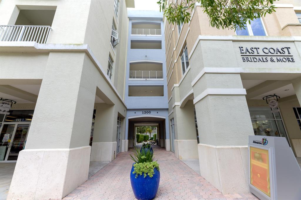 Amazing ideal location in The Village at Abacoa. This 1 bedroom/1 bath condo is steps from all that downtown offers.  New bedroom flooring and freshly painted.  Premium assigned parking and a balcony with views of cafes, shops and restaurants. Pool, bike rack and storage available.Urban living with many options close by...beaches, golf, baseball stadium, amphitheater, I-95.