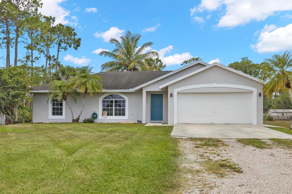 Come see this cute, 3 bed 2 bath Loxahatchee home sitting on 1.3 acres on a recently paved road! The original owners have impeccably maintained this home.  Plenty of room to add a shop or guest house.  Extremely close to Frontier Elementary, Osceola Middle School and Seminole Ridge High School.  Also nearby are parks, restaurants, shopping.