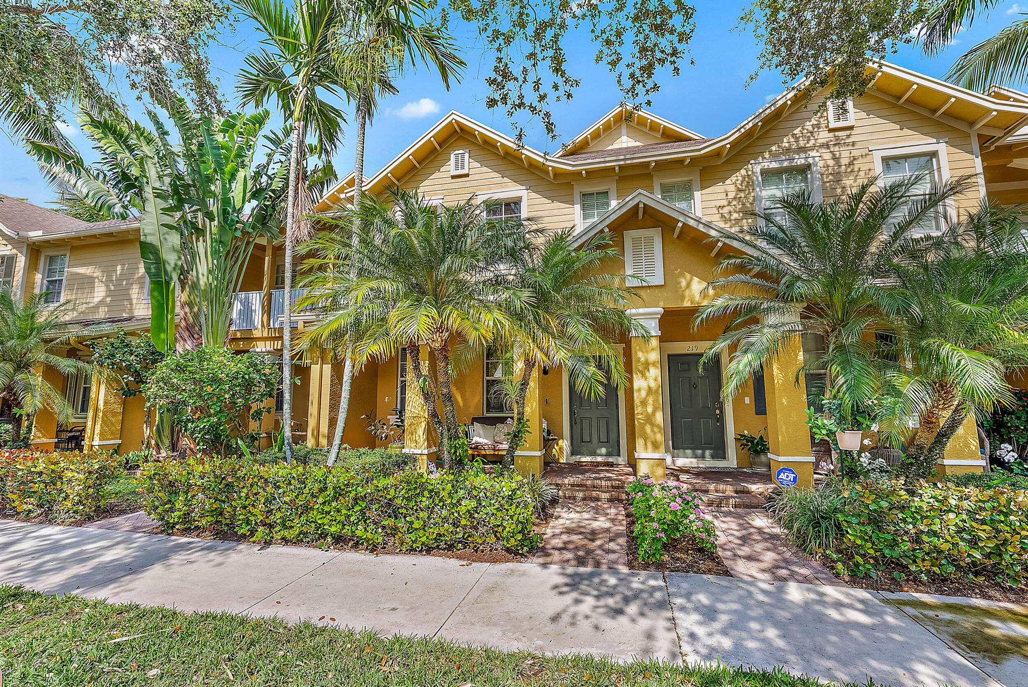This SPACIOUS and CHARMING townhouse in the DESIRABLE community of Botanica in Jupiter is the one you have been waiting for! This impeccably kept 3 bedroom and 2.5 bathroom townhouse makes for the perfect place to call home or a perfect investment or vacation property. With 1,600 living square feet, this SPACIOUS townhouse has everything you need, including a loft area which can be used as your home office or a play area. The townhouse has a 1-car garage, an ADORABLE and fully fenced backyard, a great outdoor space to grill, and relax, gather and enjoy the PERFECT South Florida weather year round! As you enter your COVERED entryway, you are greeted by beautiful white tile flowing effortlessly throughout the first floor.