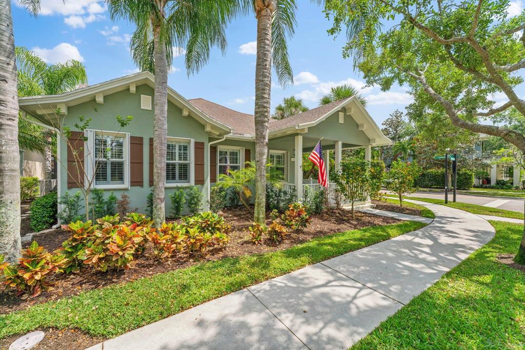 Welcome to 243 Caravelle, a stunning and completely renovated 3-bedroom, 2-bath single-family home situated on a spacious corner lot in the highly sought-after Martinique neighborhood of Abacoa. Boasting high ceilings and exquisite crown molding, this property offers an inviting atmosphere throughout. The entire house features beautiful porcelain wood-look tile flooring, adding a touch of elegance to every room. The kitchen has been tastefully updated with white shaker cabinets, trendy open shelving, a custom backsplash, quartz countertops, and top-of-the-line stainless steel appliances. It is a true chef's delight. The interior and exterior have been fully painted, including the front and back decks, lending a fresh and vibrant feel to the entire property.