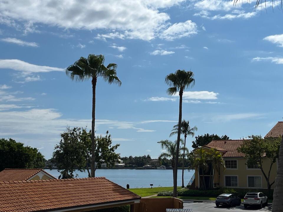 Exceptional opportunity to purchase a 2 bedroom 1 bath condo in the sought after Yacht Club on the Intracoastal. This unit was totally updated with porcelain floor throughout, new SS appliances, new cabinets, quartz countertop, open kitchen, popcorn removed, new vanity with matching quartz and a shower stall with an inlaid stone floor. The unit has intracoastal views from the covered balcony. The Yacht Club has it all from a pool, tiki bar, spa, clubhouse, gym, gated and business center directly on the intracoastal waterway. Other amenities include a marina, tennis courts with night lights, volley ball court, a mediation pond, a dog run and a kiddie play area. The Yacht Club, which is gated, features plenty of green open space with BBQs scattered throughout. A truly unique subdivision.