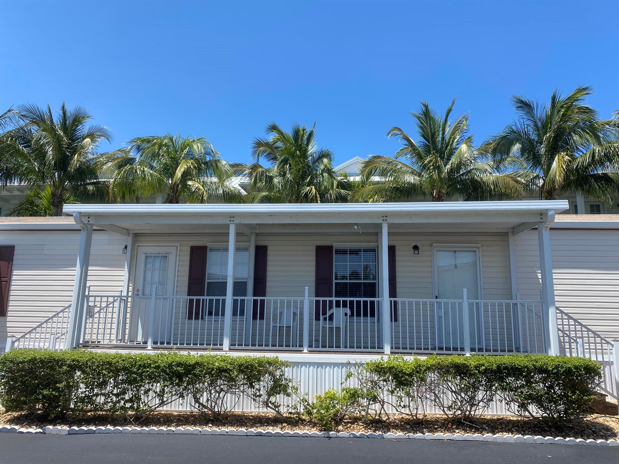 Sought-after single family home rarely available in Juno Beach Condo's where residents own LAND AND HOME. 1 block to the beach and fishing pier and 2 minutes walk to all the restaurants and shopping you could need. Make this charming, tight-knit 55+ community with only 71 residential units your new FLorida home. The well-maintained, 2 bed/2 bath, split-plan home features a large porch for morning and evening relaxing. Washer/dryer inside, and extra storage in your outdoor shed. Offered furnished. Underground electricity and sprinkler system, private parking space. VERY LOW HOA. Included in HOA: Water, Sewer, Trash, landscaping, clubhouse, petanque, shuffleboard. 1 small pet okay. Can lease right away 2 times a yr and a min. of 2 months. No RV's or Boats.