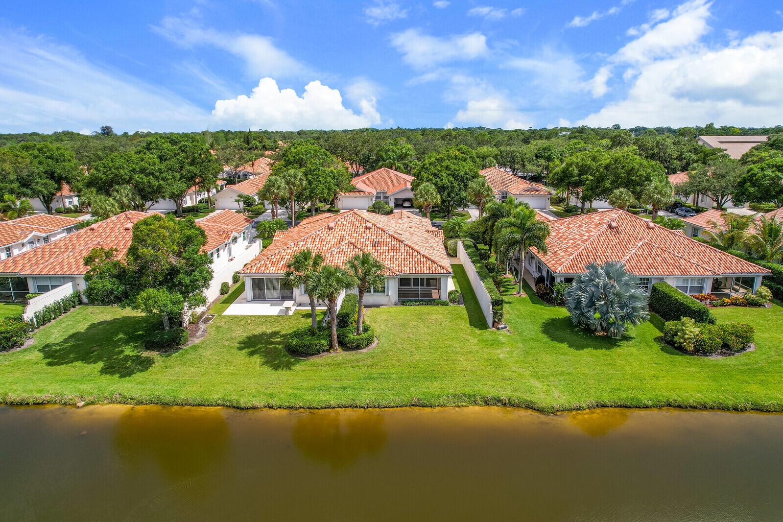 Immaculate, ready to move-in lake front home. Serene lake views from the great room, master bedroom and screened in patio. Sought after Divosta ''Built Solid'' Capri floorplan with 2BR/2BA/2CG. Featuring open plan, impact windows, accordion shutters, plantation shutters, granite counters, stainless steel appliances, laminate and tile floors and much more. Both bedrooms have large walk in closets. Cypress Lakes is a small enclave of homes with tree lined streets. HOA includes cable, internet and lawn care. Centrally located near I-95, Fl Turnpike, shops and restaurants.
