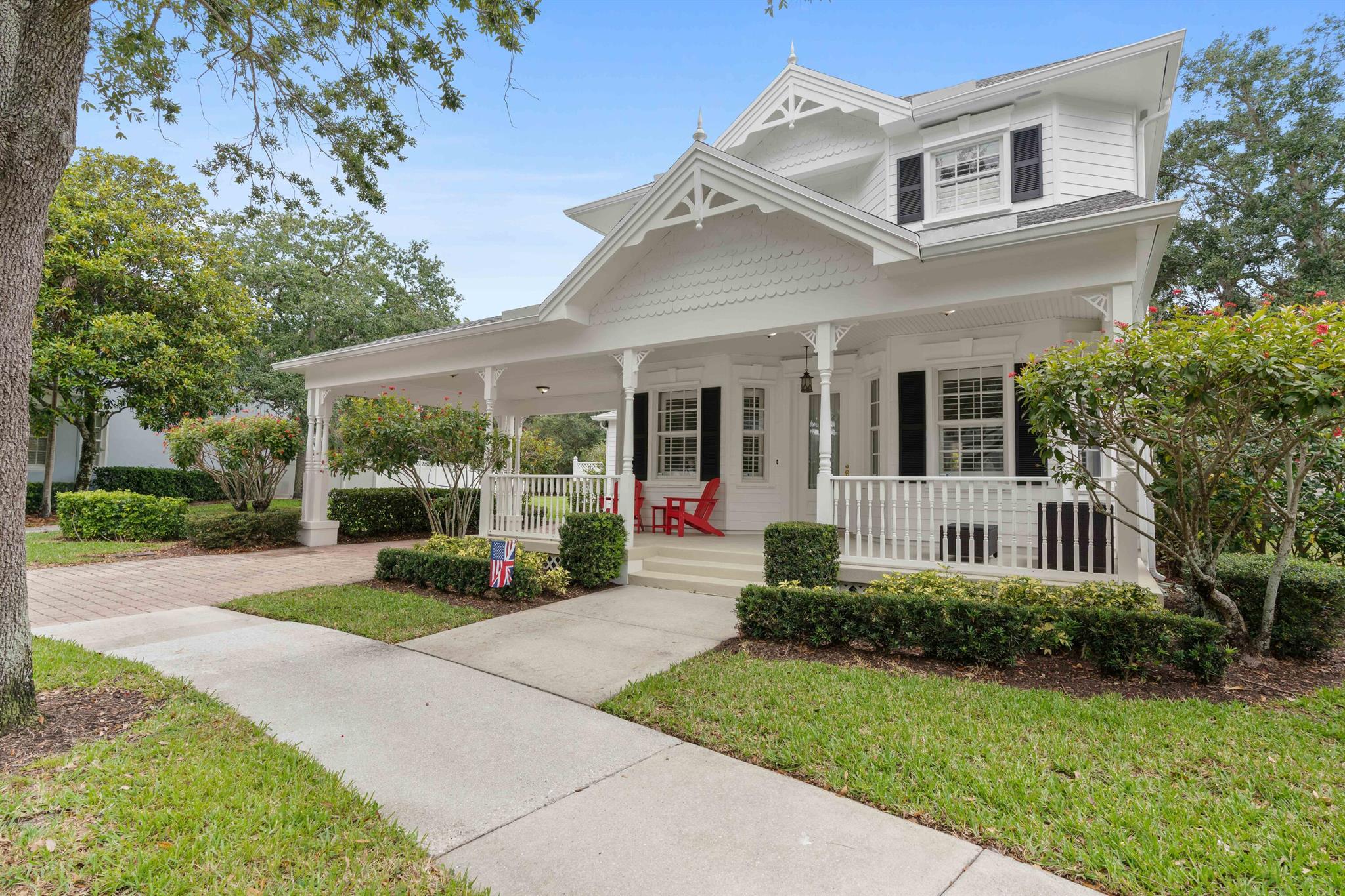 This home is located on a large pie shaped outside corner lot on a gorgeous live oak canopied street with with beautiful private pool and separate raised seating area/fire pit.  The convenient porte cochAre allows for extra shaded parking and dry unloading of luggage and guests.  The large covered front porch gives the feel of ''old Florida'' living and the opportunity for easy outdoor living and friendly neighborly conversation.      Life is easier close to world class everything: Jupiter Medical Center, Downtown, Youth sport & Amphitheater, Roger Dean Stadium, live music & special events, fabulous food, shopping, and unparalleled beaches, including Jupiter's famous dog-friendly beach!
