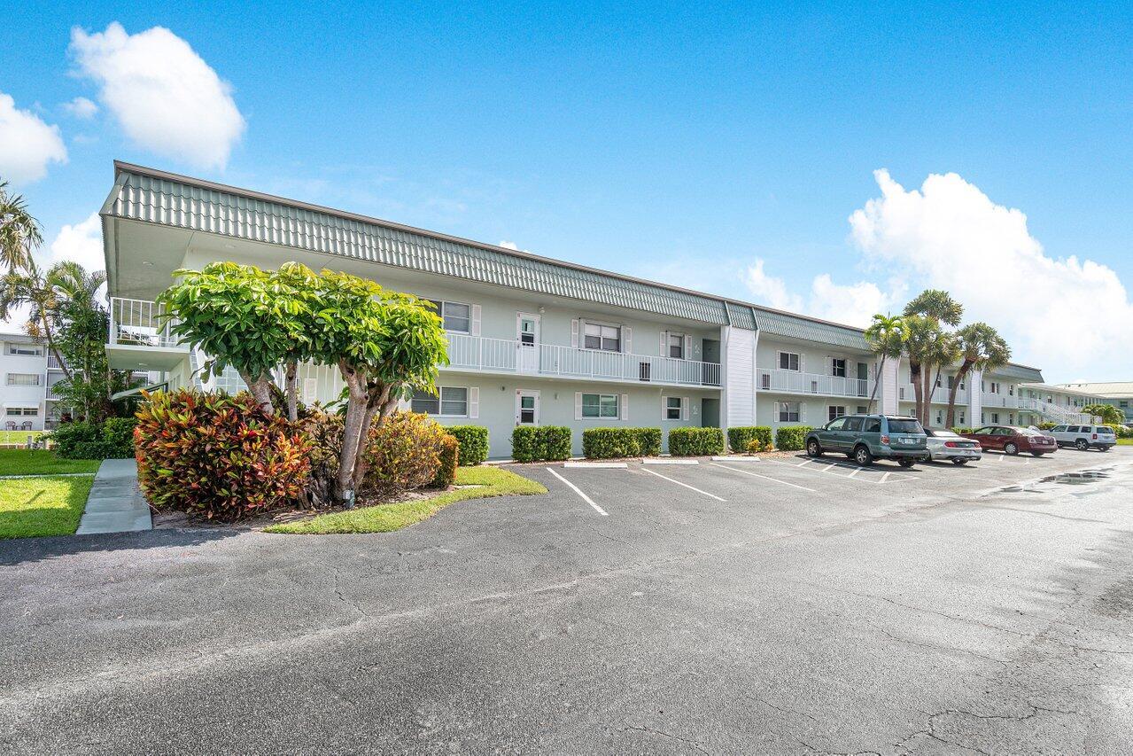Paradise awaits you!  Beautiful renovated 2/2 on the FIRST floor nestled in the heart of North Palm Beach! Enjoy the ocean breeze from your private screened in patio with canal and intracoastal views!  Updated kitchen with snack bar, extra cabinets and additional counter/bar area with beverage cooler.  Completely renovated bathrooms and neutral tile through out entire unit!  Perfect location close to downtown, restaurants, shopping and beaches.  All ages, community pool and common laundry room.  Please note that there is no leasing for the first 2 years of ownership and there is currently a wait list to rent a boat slip.