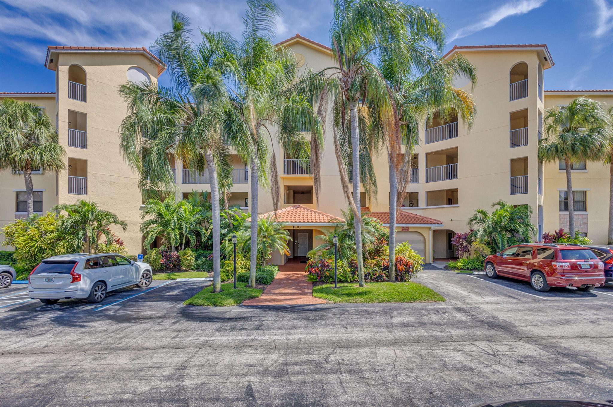 Your very own tropical oasis nestled in the heart of Juno Beach, FL. It's the best of both worlds close to work, play, shops, and restaurants. This first floor condo is an open floor plan with elegant diagonally laid tile throughout and an updated kitchen. Private guest quarters away from the primary bedroom suite. Open dining and living room flow to secluded screened-in back patio with views to the lake and fountain. Enjoy your morning coffee or evening beverages while you watch the ducks play in the water. Gorgeous Updated Clubhouse with exercise room, pools, and hot tubs. Newer A/C and water heater. Completely furnished in a tasteful Florida style--just bring your toothbrush. What's not to love? Must See!