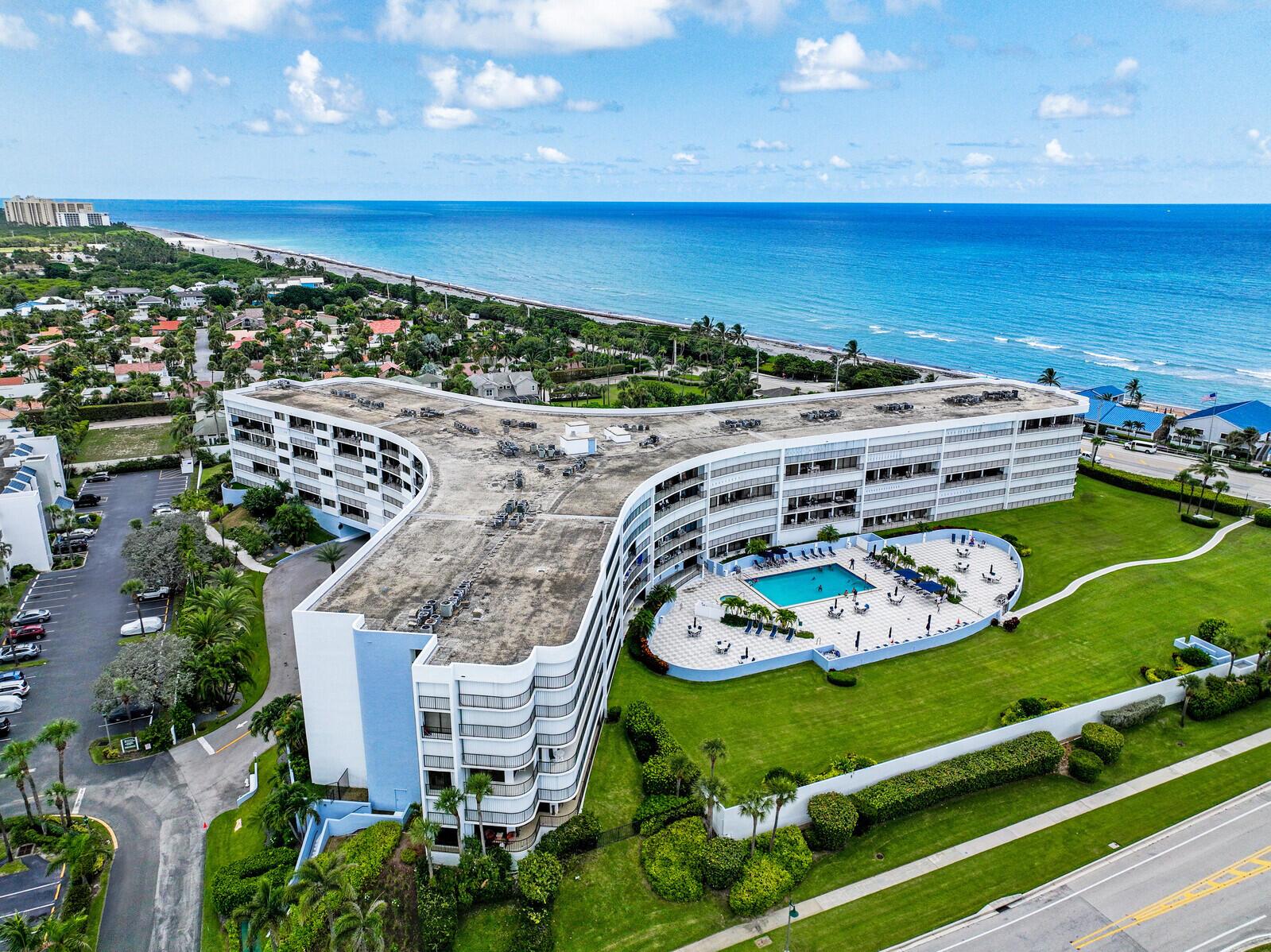 This OCEANFRONT, TURNKEY modern, renovated 2 bed, 2 bath condo situated on the turquoise waters of Jupiter's beaches is rentable immediately. Conveniently located on the first floor by the myriad of amenities and with 2 garage parking spaces, this will not last. Live like you are on vacation & enjoy amenities like a pool, spa, gym, library, community room, 24 hour security, ample under building parking, a carwash station and bicycle room. The unit is complete with a laundry room, two walk in closets and it's own external storage room. Low HOA fee includes cable, high speed internet, water and reserve funds; nothing to worry about here! Sold completely furnished and turnkey, with everything you need to make this home. Just bring your clothes, grab a key, and make this your beach paradise